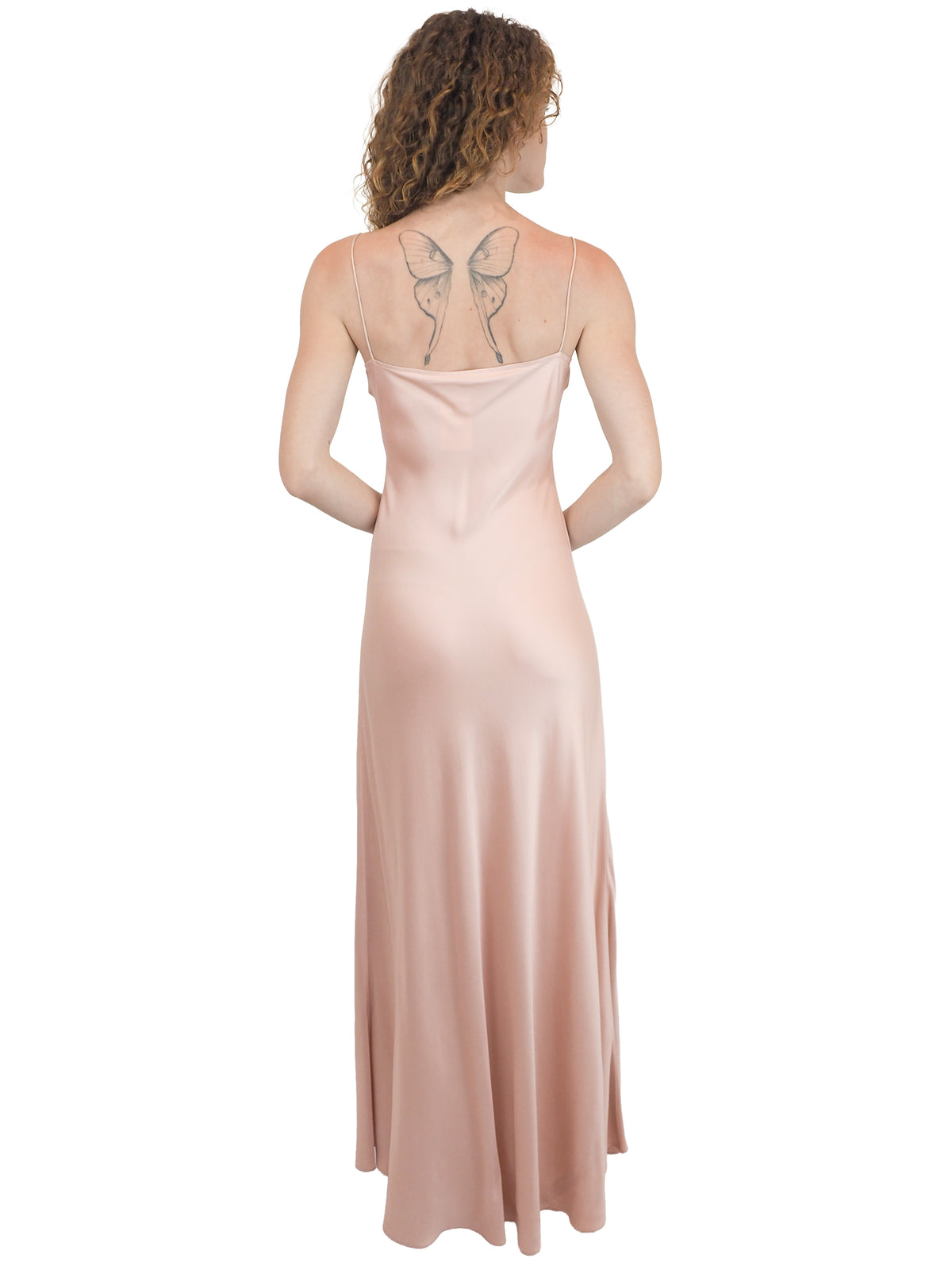 A vintage bridal pale pink satin silk slip dress with spaghetti straps