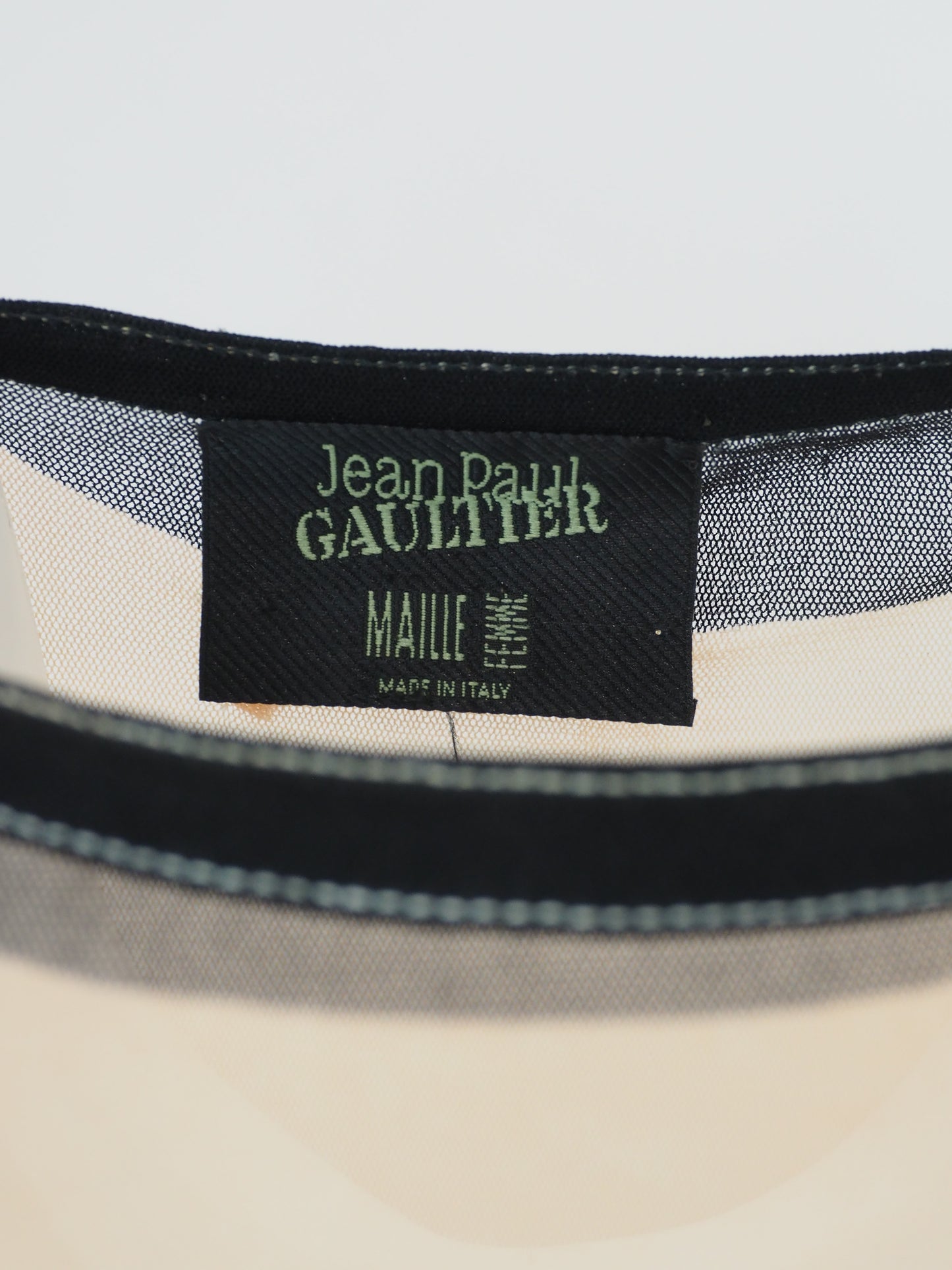 A women's jean Paul gaultier vintage  long-sleeve mesh top in light green with a floral rose print border and black trim details
