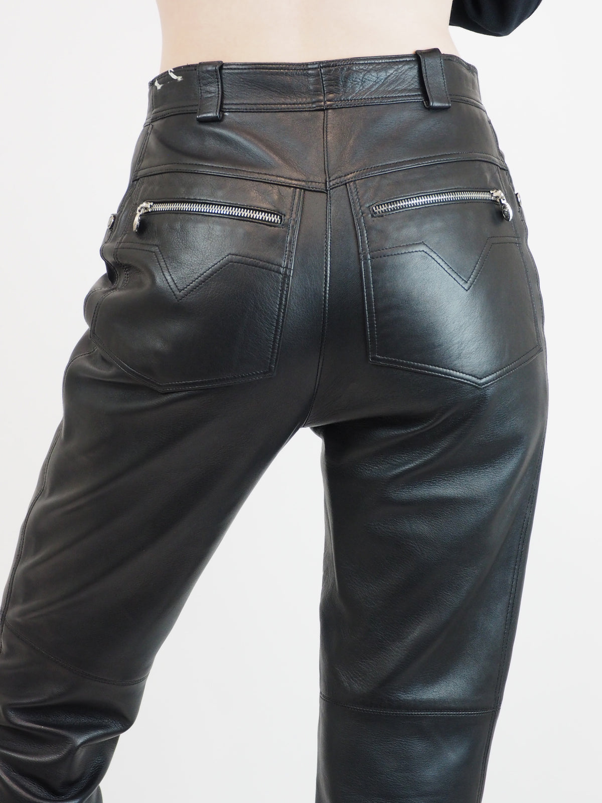 Vintage Versace Black leather cropped pants with a straight-leg fit