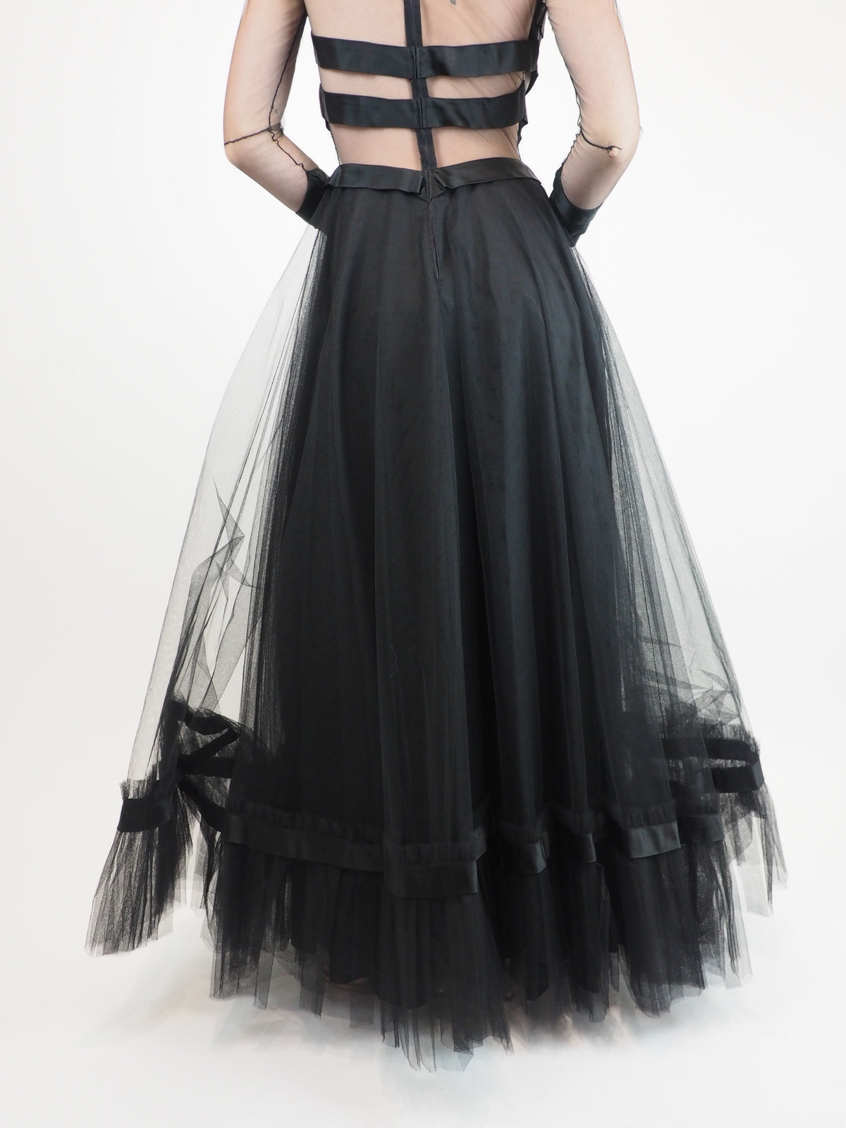 a vintage loris azzarro black strappy tulle formal gown with a sheer chevron satin bodice and layered tulle skirt