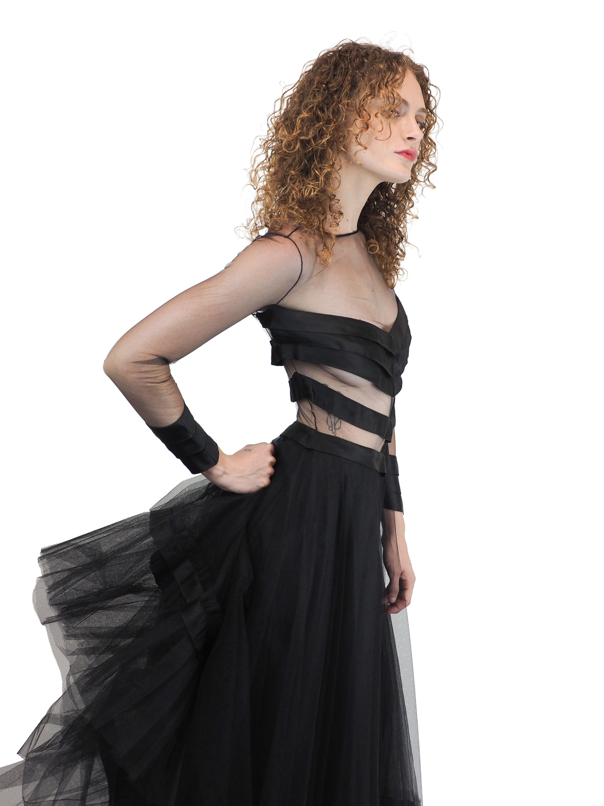 a vintage loris azzarro black strappy tulle formal gown with a sheer chevron satin bodice and layered tulle skirt