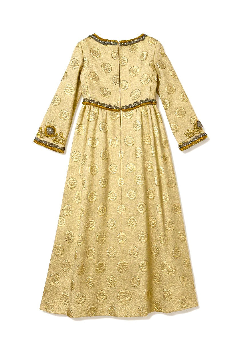 back of gold vintage long sleeved dress with gold embroidery