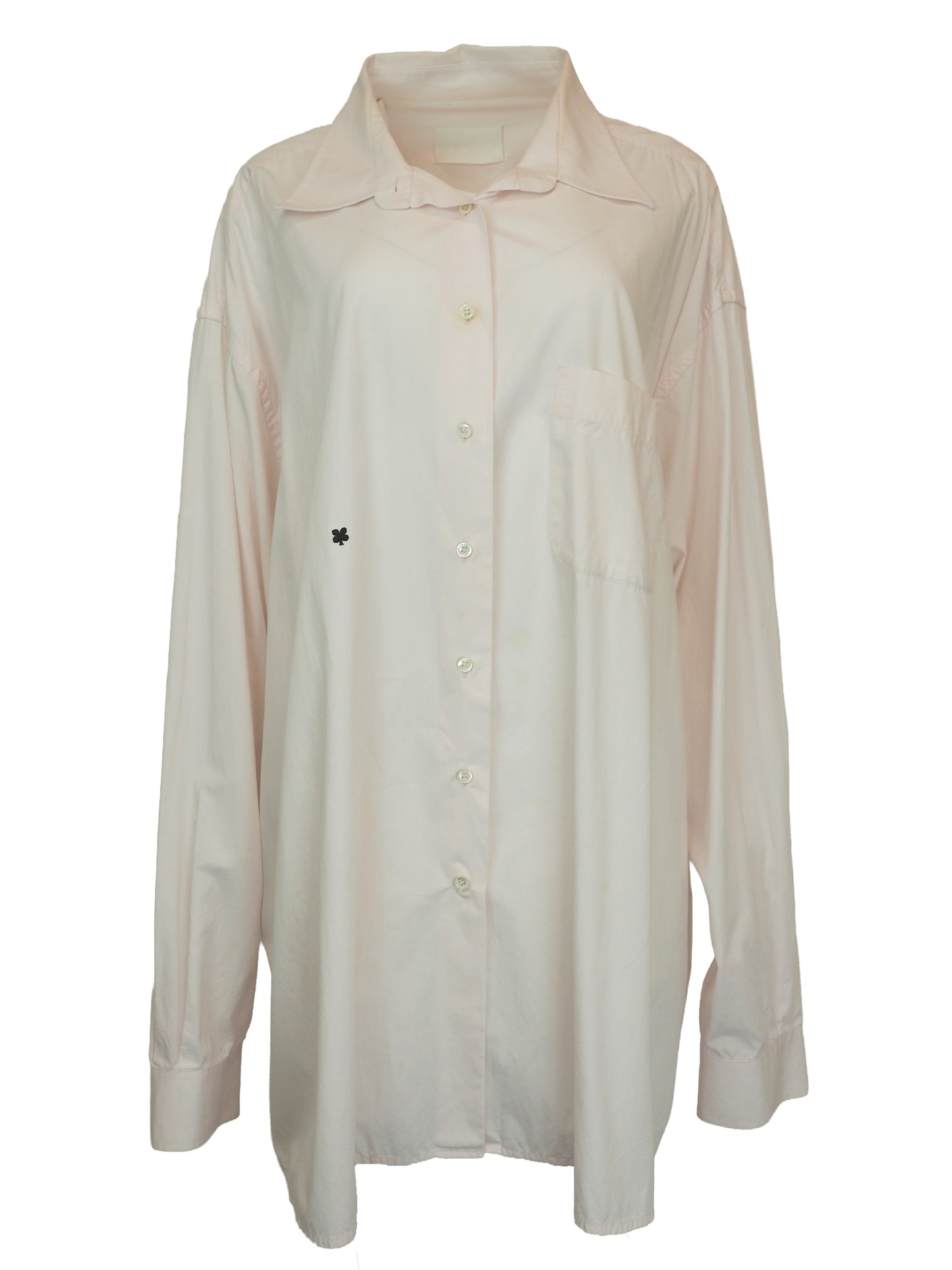 A vintage Maison Martin margiela 2001 pale blush pink oversized button-down shirt dress with a pointed collar, long sleeves, and a small black embroidered clover on the left chest