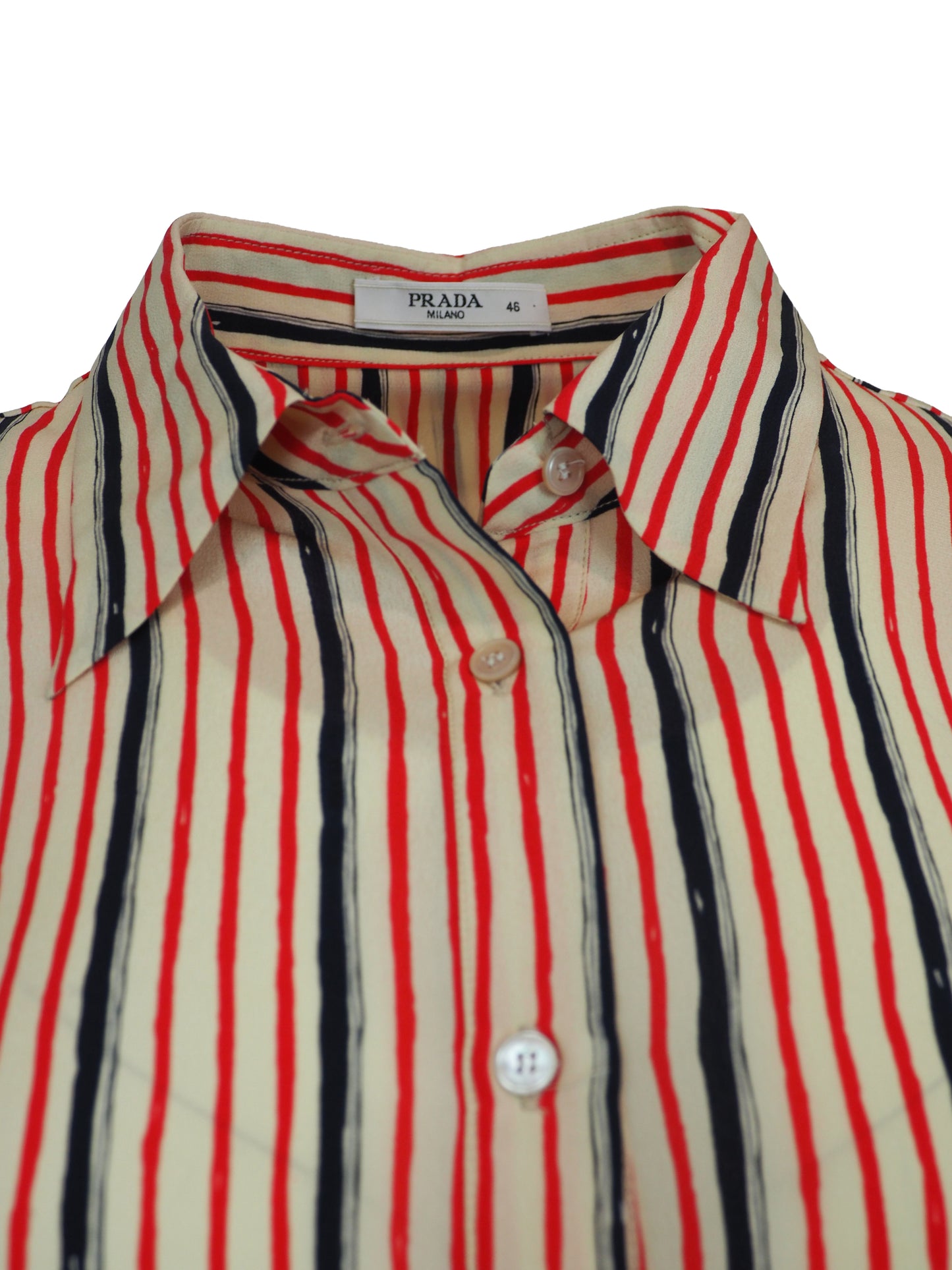 A women's vintage Prada long-sleeve button-up shirt with vertical stripes in red, black, and white, featuring a pointed collar and button-front closure.