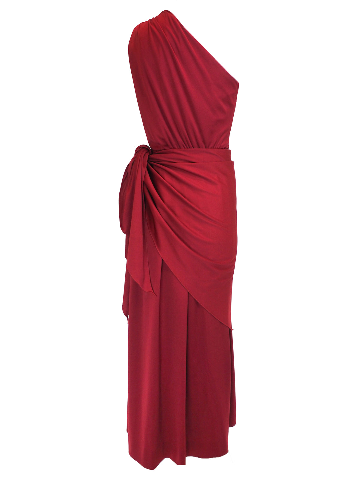 A vintage 1970s red one-shoulder maxi dress with a draped, wrap-style bodice and a matching waist tie