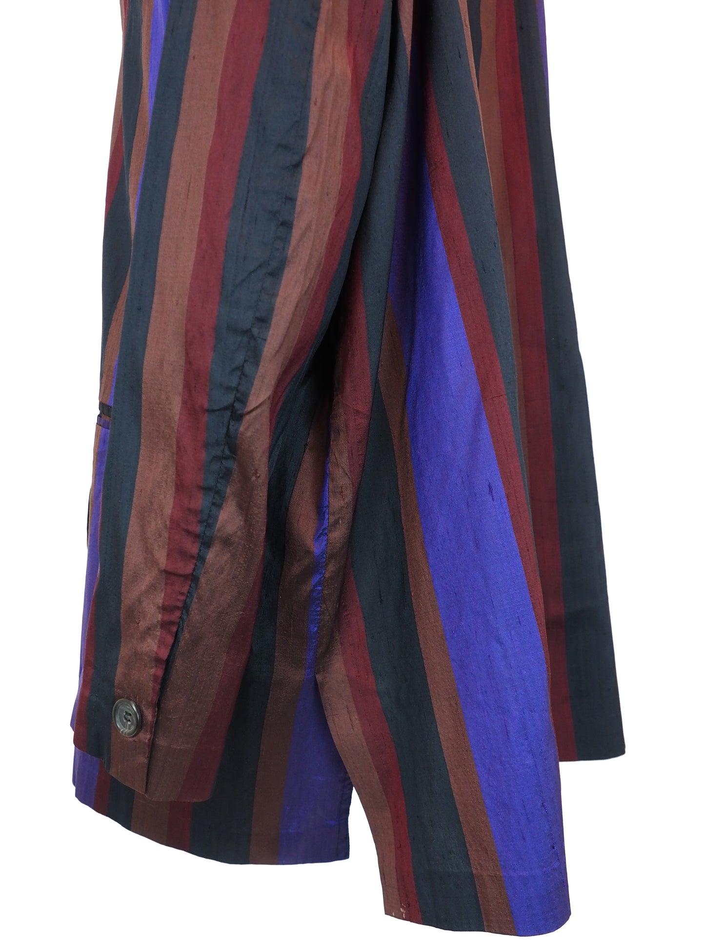 Romeo Gigli Vintage. A long-sleeve striped blazer with vertical stripes in purple, rust red, and black, featuring a three-button front closure and flap pockets.