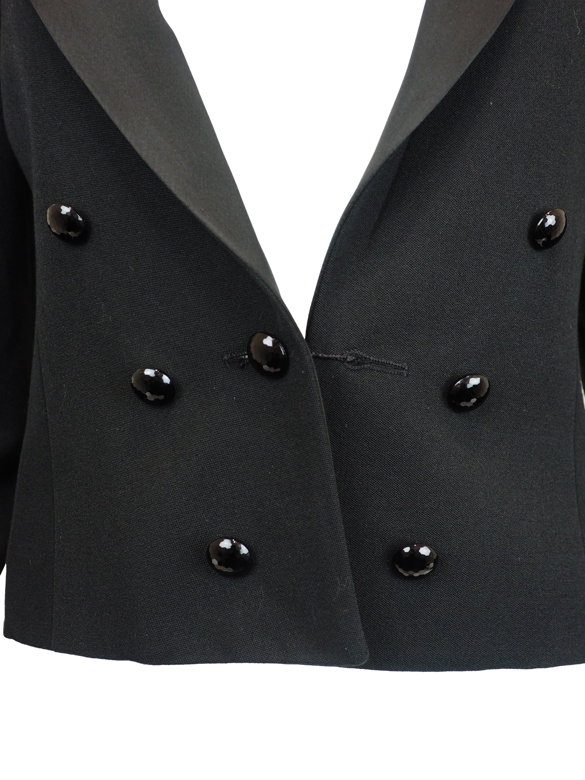 A vintage saint laurent black double-breasted blazer with satin peak lapels