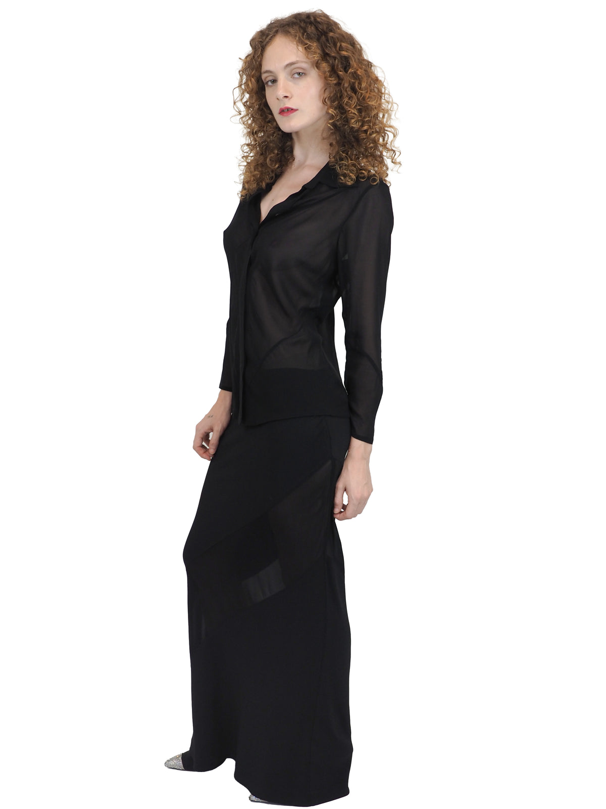 A vintage 90s tom ford for gucci black sheer long-sleeve blouse and a matching black maxi skirt with sheer side panels