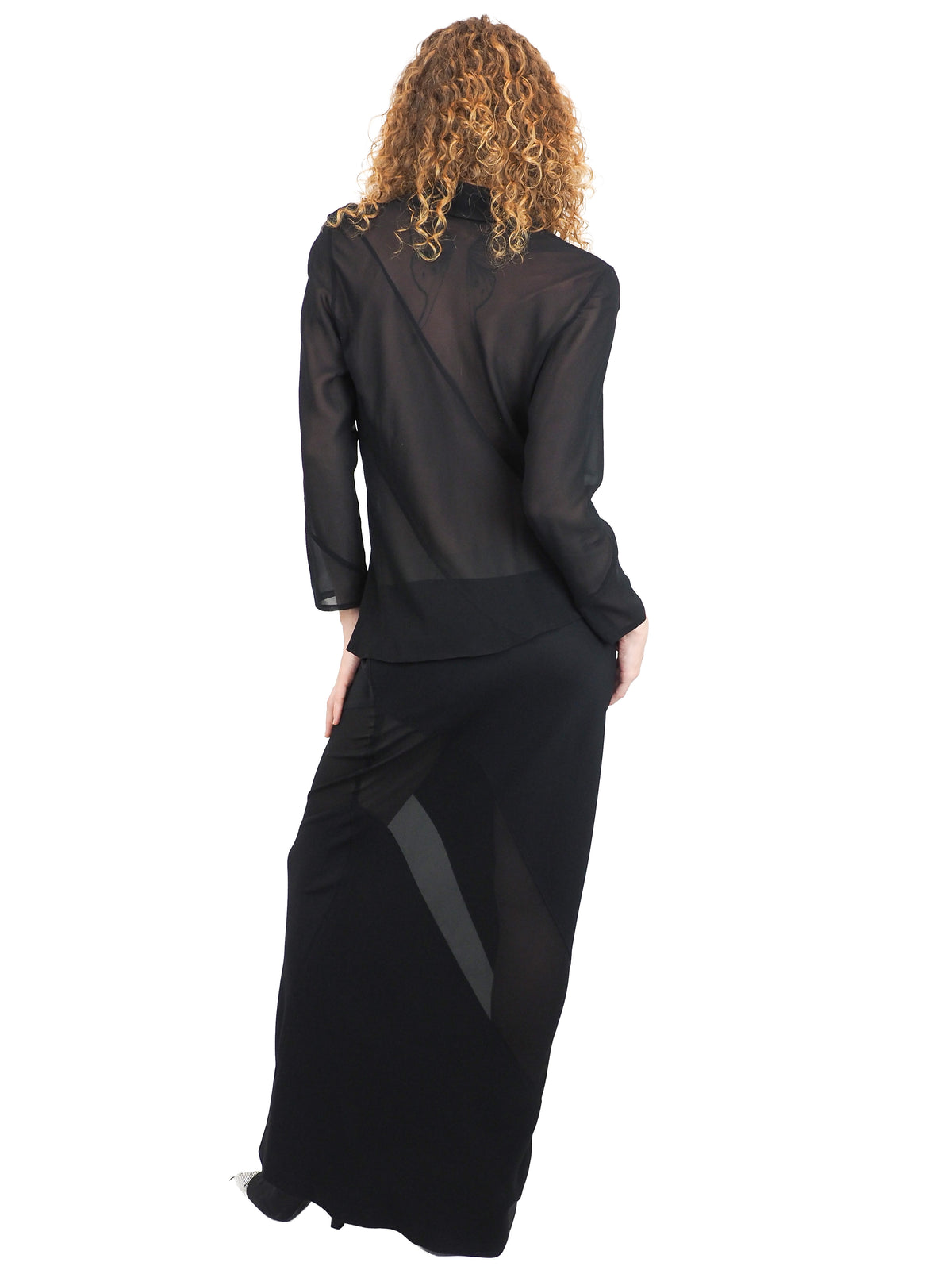 A vintage 90s tom ford for gucci black sheer long-sleeve blouse and a matching black maxi skirt with sheer side panels
