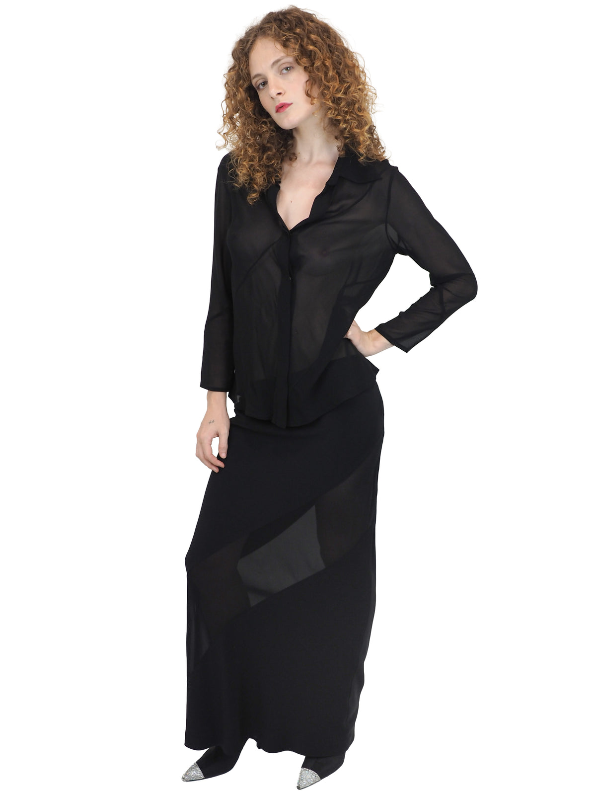 A vintage 90s tom ford for gucci black sheer long-sleeve blouse and a matching black maxi skirt with sheer side panels