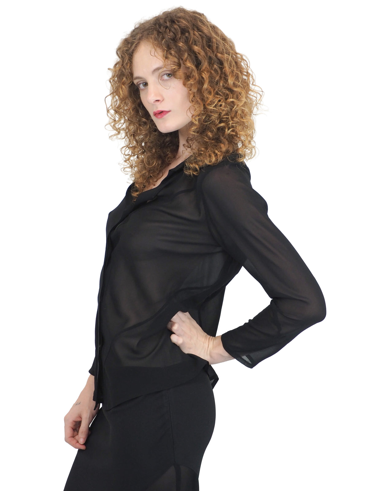 A vintage 90s tom ford for gucci black sheer long-sleeve blouse and a matching black maxi skirt with sheer side panels