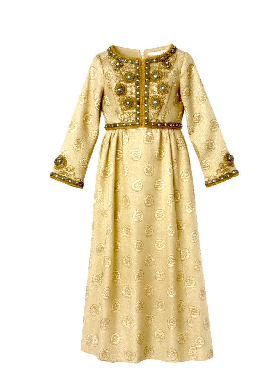Gold vintage dress with gold embroidery on a white background