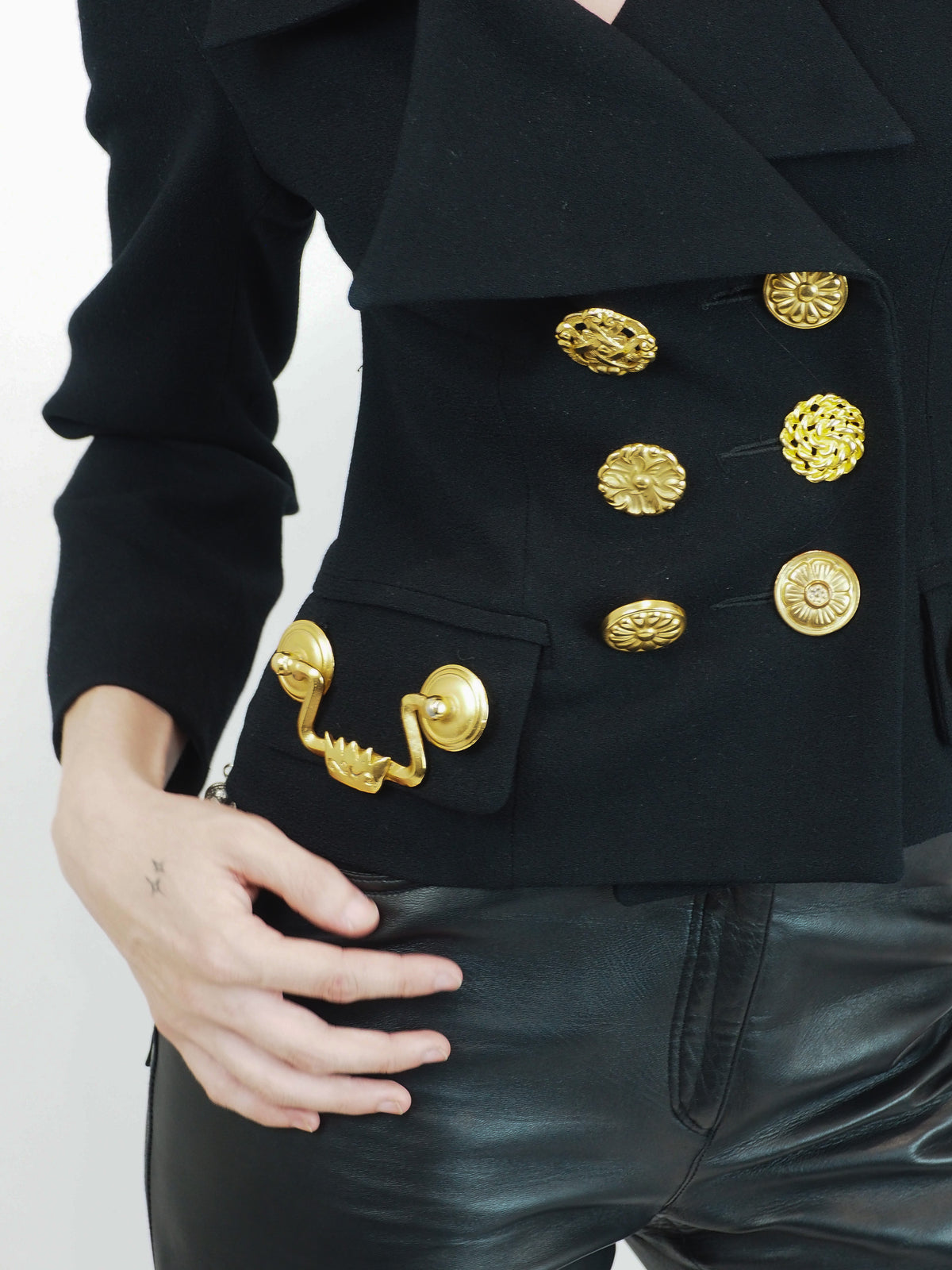 A vintage Todd oldham black double-breasted blazer with prominent gold handle buttons 