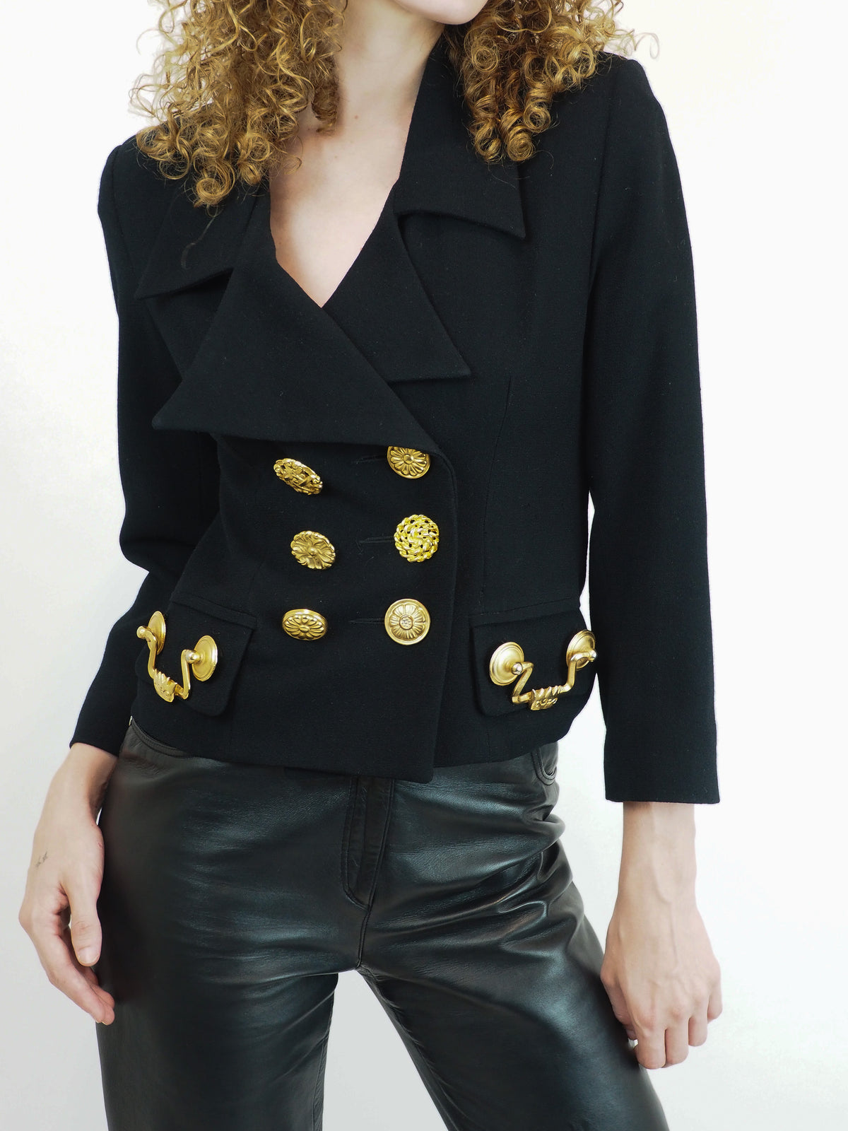 A vintage Todd oldham black double-breasted blazer with prominent gold handle buttons 