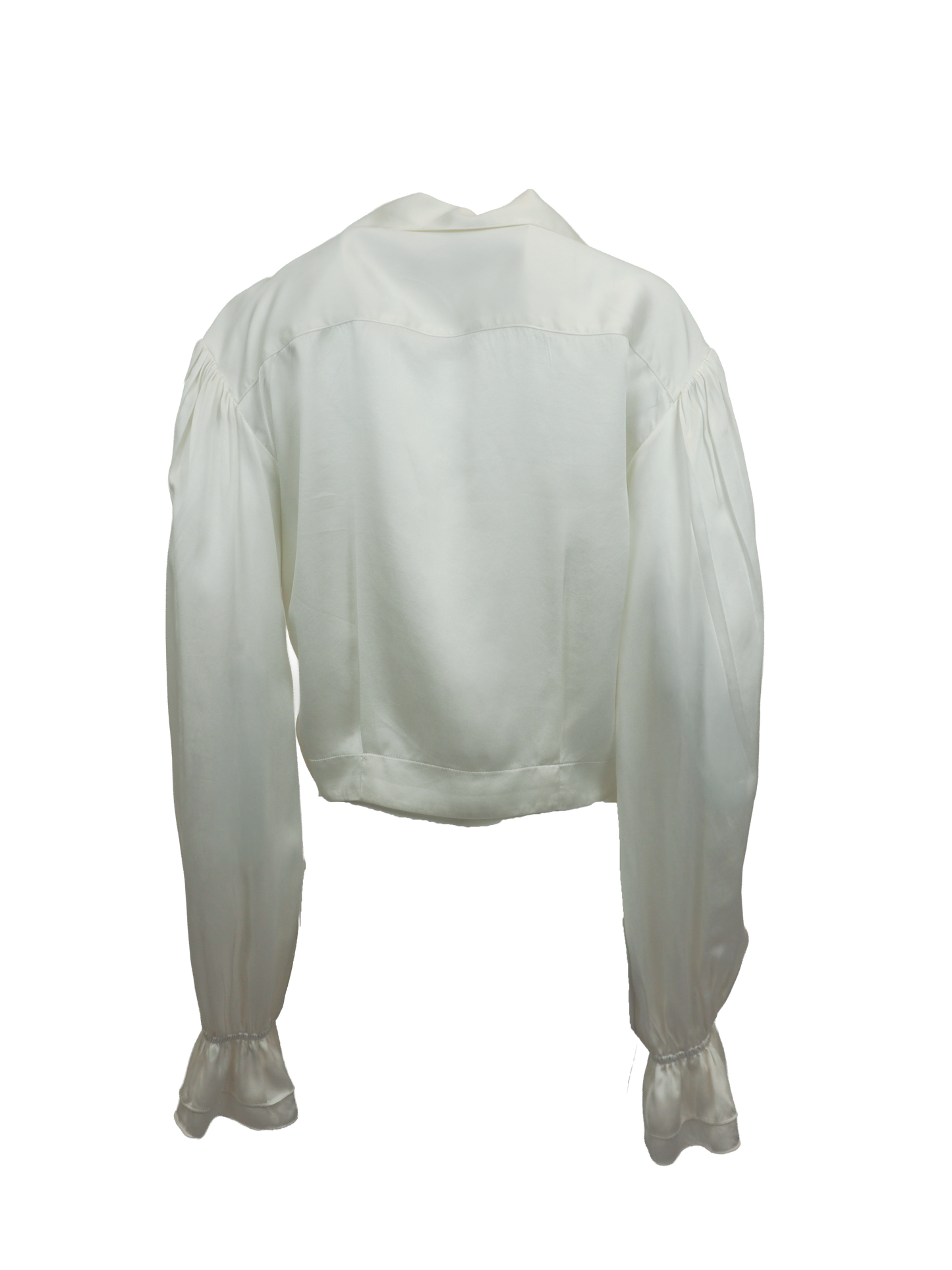 vintage designer Jane booke. An off-white silk blouse with a pointed collar, buttoned front, and dramatic ruffled cuffs, shown against a plain white background.