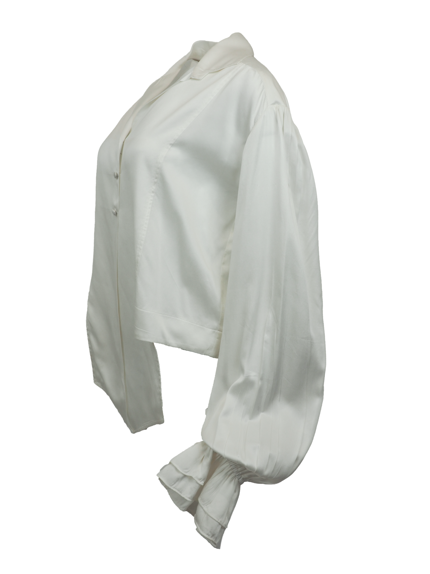 vintage designer Jane booke. An off-white silk blouse with a pointed collar, buttoned front, and dramatic ruffled cuffs, shown against a plain white background.