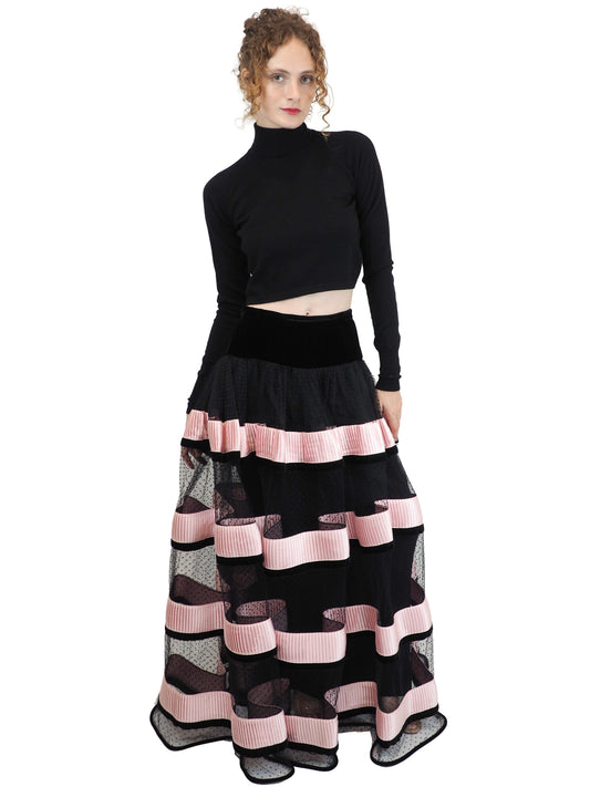 A vintage Valentino 1992/1993 long polka dotted black skirt with pink striped mesh panels