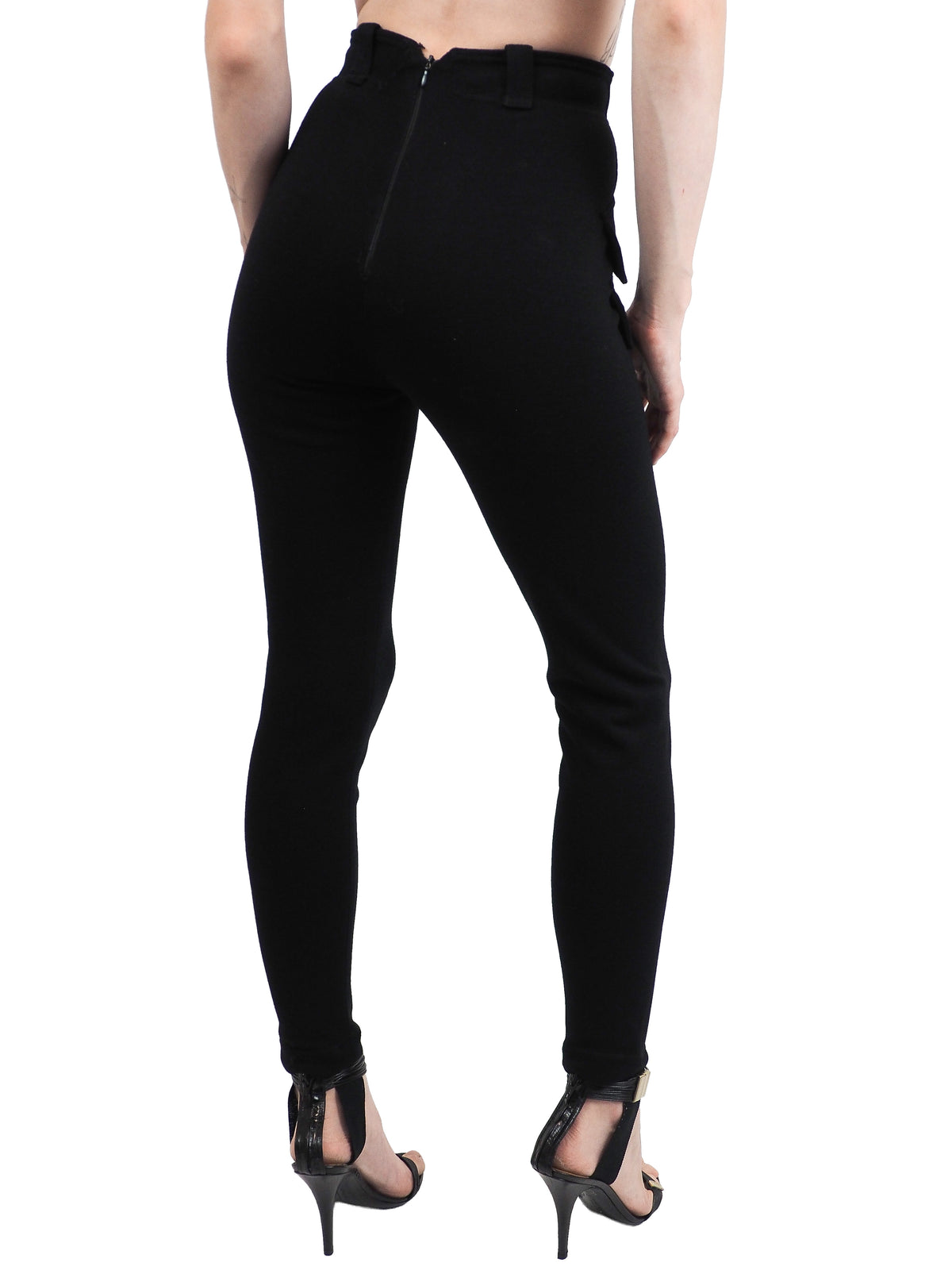Black vintage Versace high-waisted skinny pants with flap pockets and gold medusa button details