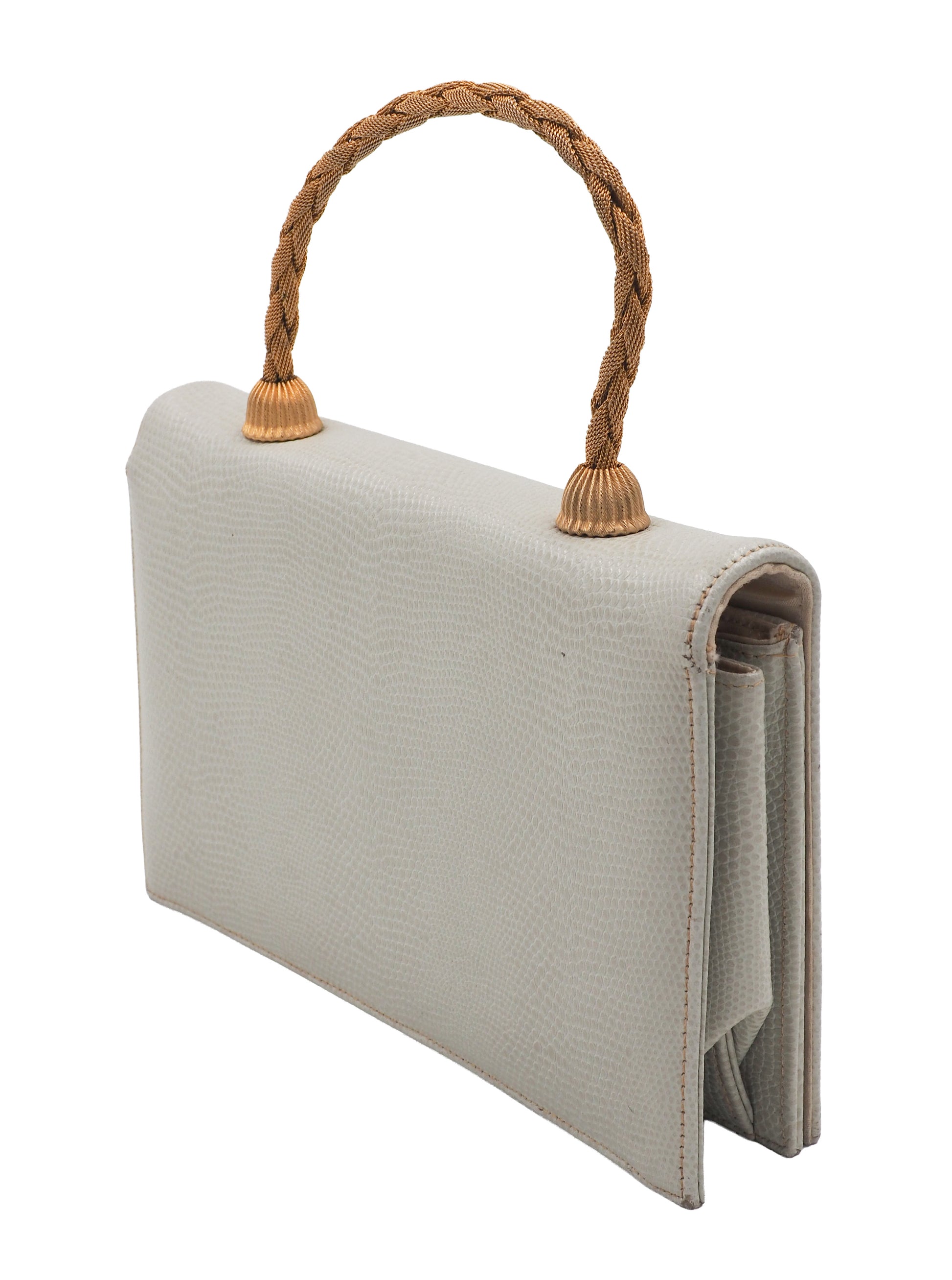 A vintage white lizard textured leather clutch handbag with a braided tan rope handle and gold-toned metal accents