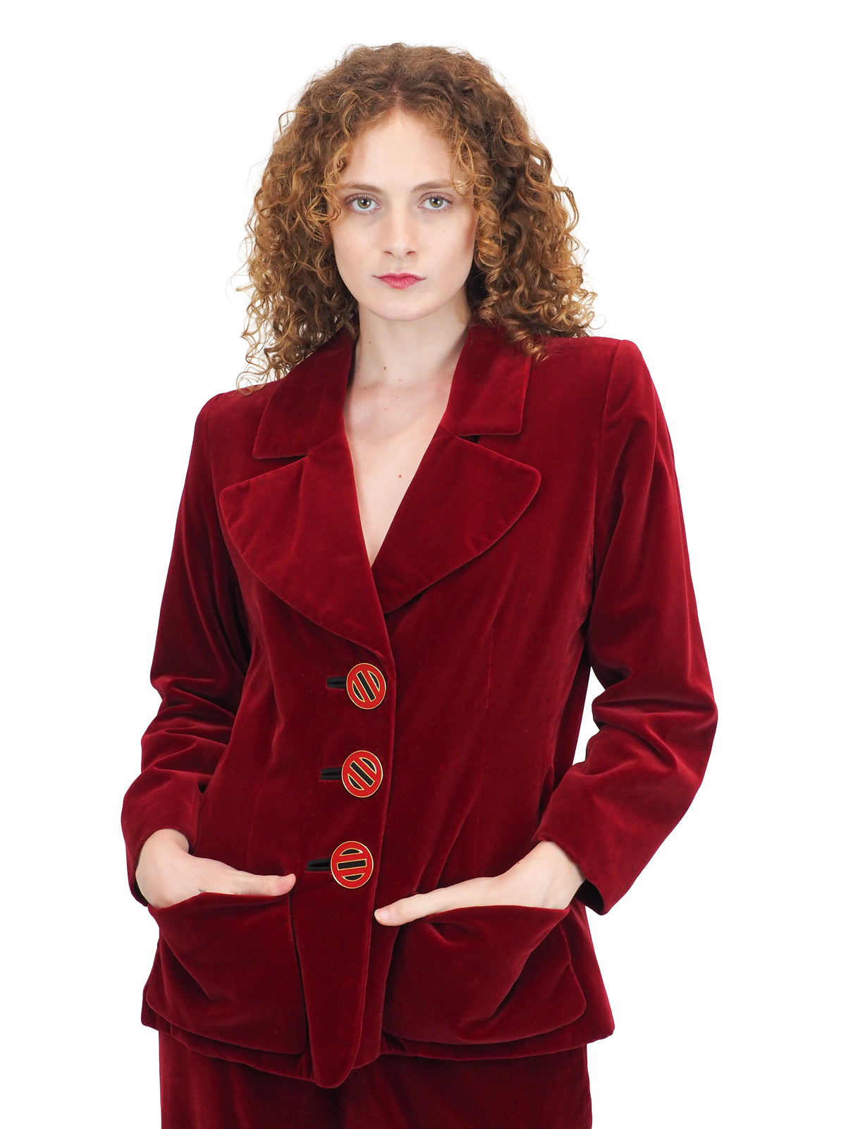A vintage YSL matching deep red velvet blazer with graphic buttons and skirt set