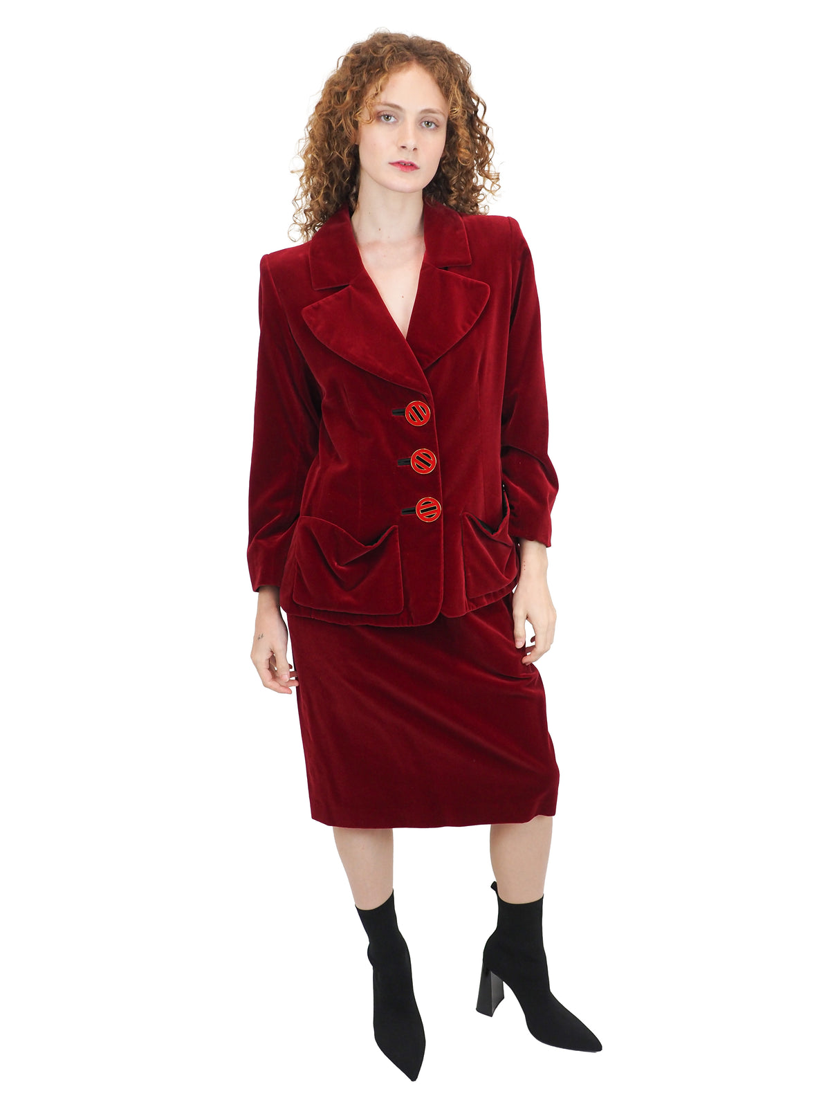 A vintage YSL matching deep red velvet blazer with graphic buttons and skirt set