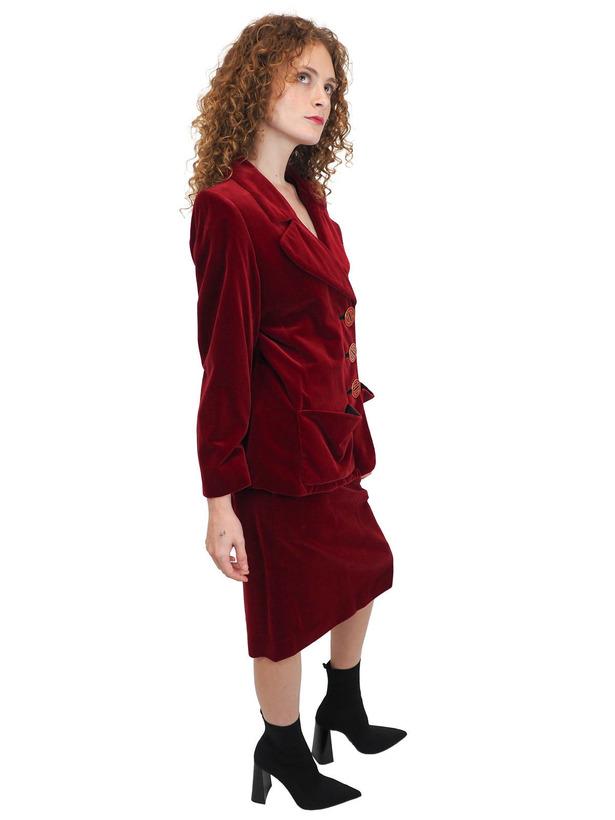 A vintage YSL matching deep red velvet blazer with graphic buttons and skirt set