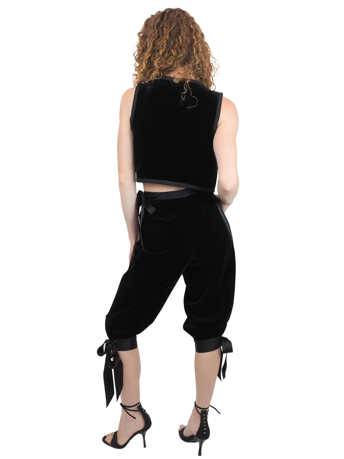 A vintage Yves Saint Laurent YSL 1970's  black velvet sleeveless vest and matching black velvet cropped pants with side ties