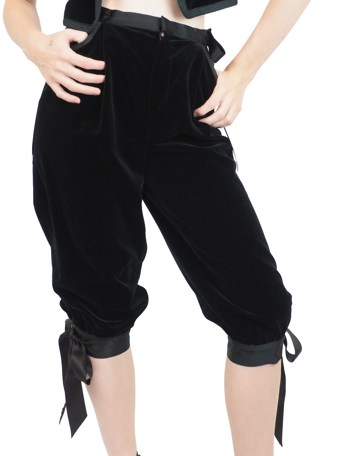 A vintage Yves Saint Laurent YSL 1970's  black velvet sleeveless vest and matching black velvet cropped pants with side ties