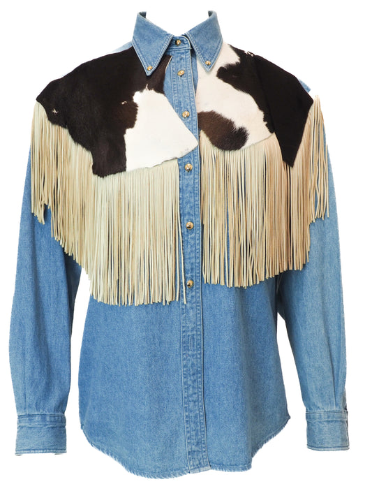 Blue denim shirt with cowhide leather and fringe accents on a white background