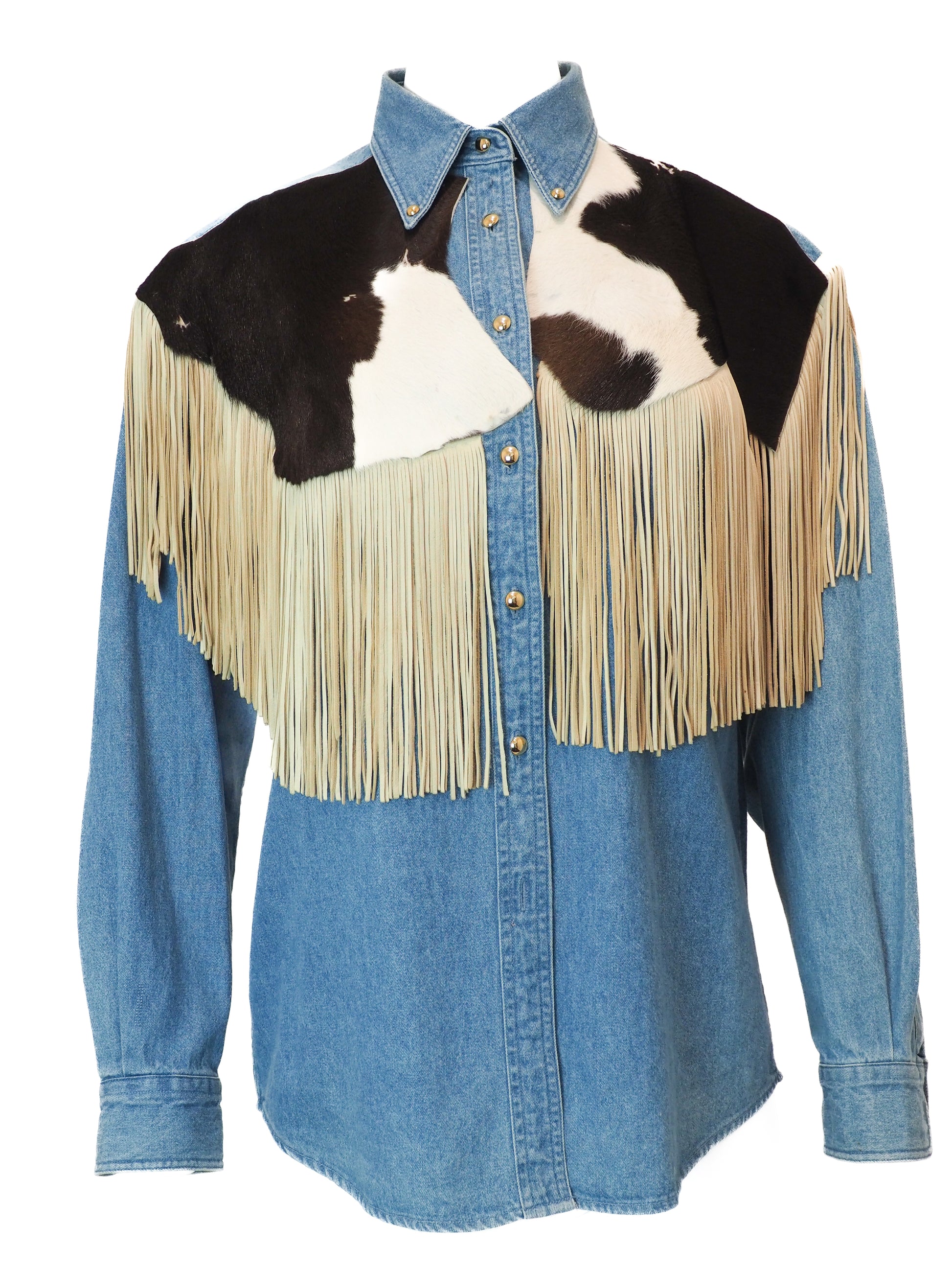 Denim shirt with cowhide leather and fringes on a white background