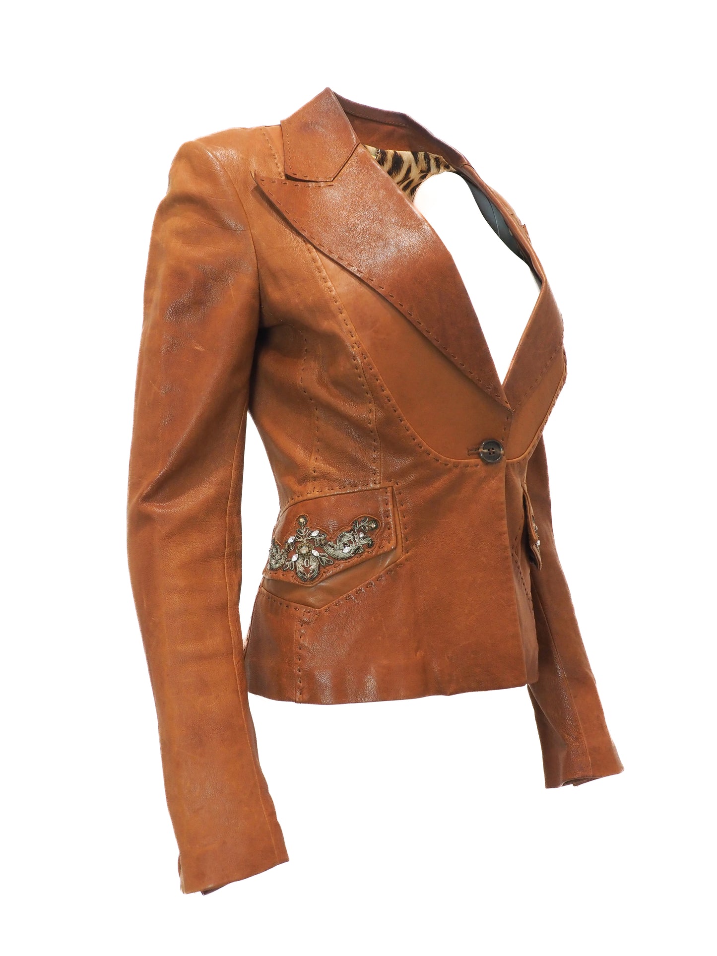 Brown leather jacket with decorative elements on a white background
