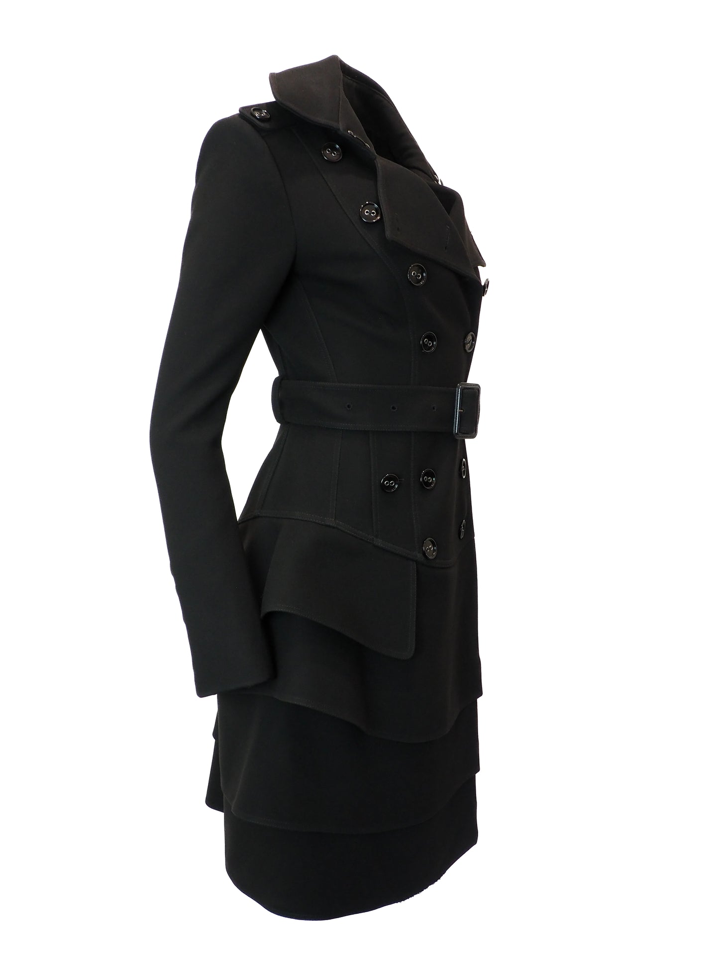 Black coat with a ruffled skirt on a white background