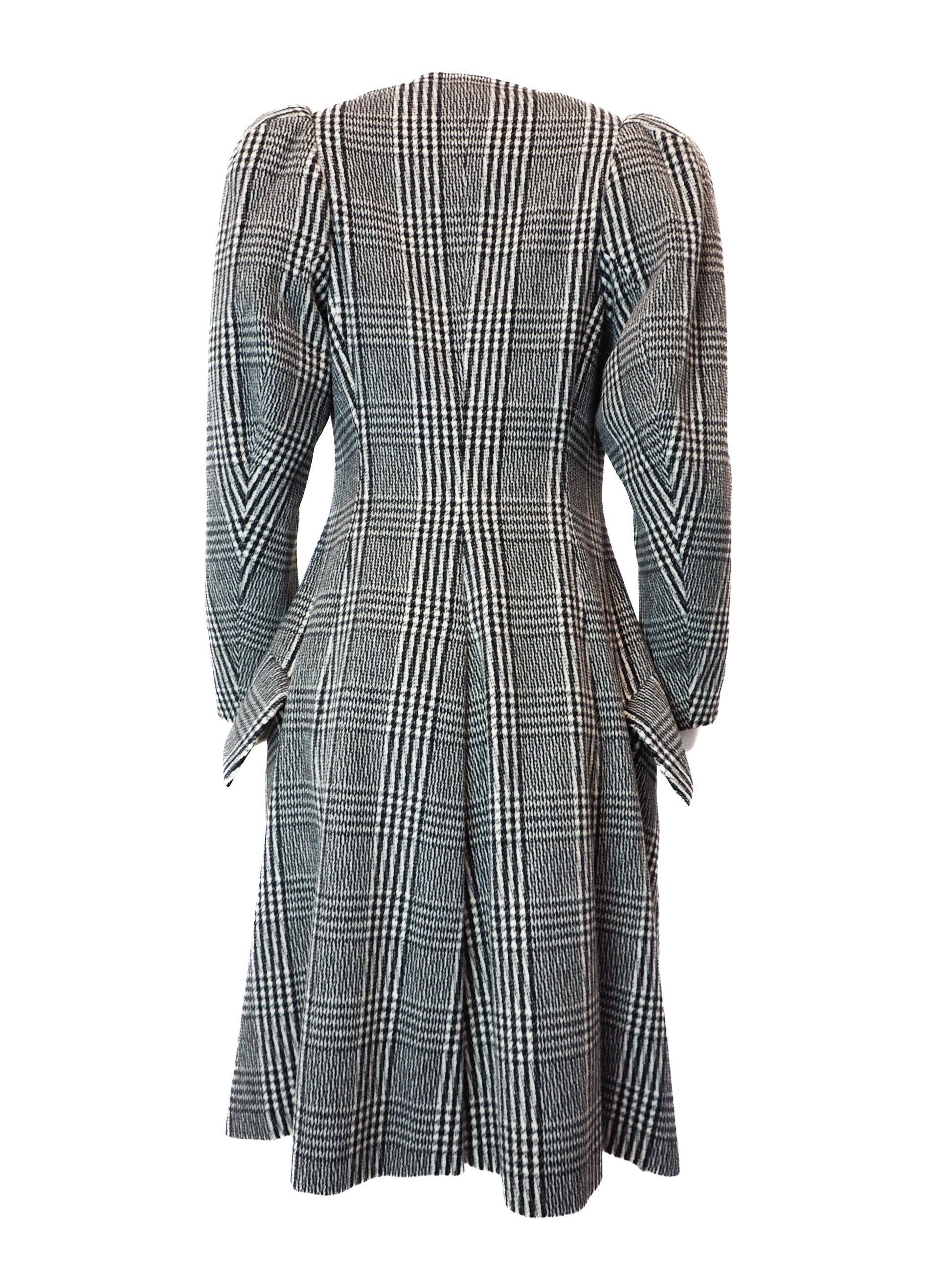 Plaid coat with puff sleeves on a white background