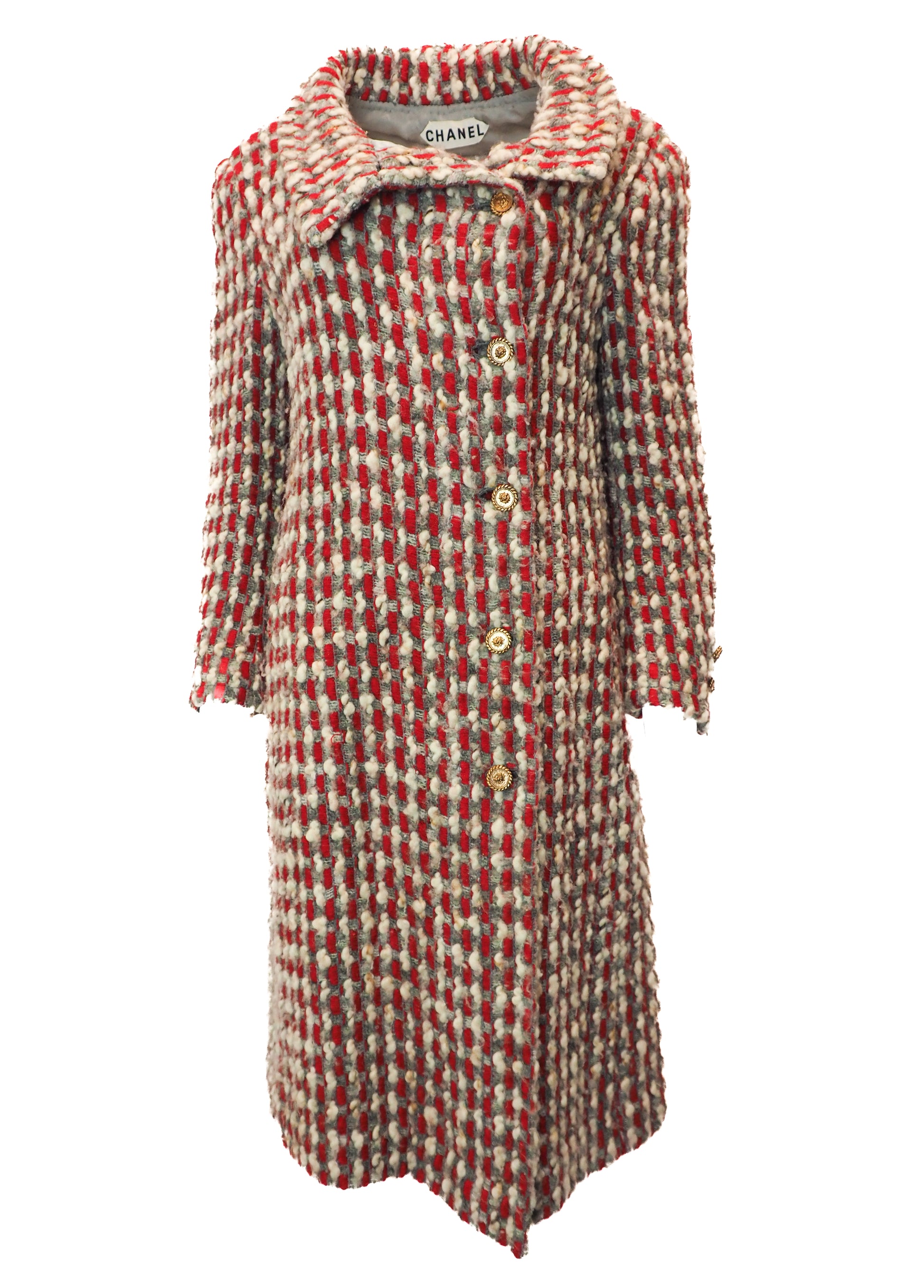 Red and beige checkered coat with Chanel branding on a white background