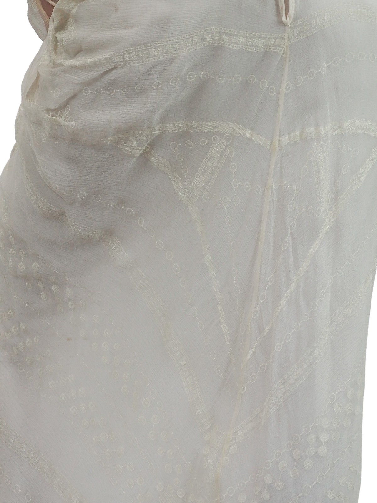A vintage Zandra Rhodes cream-colored bridal wedding dress with sheer long sleeves, pink beaded detailing, a gathered waist, and a draped skirt
