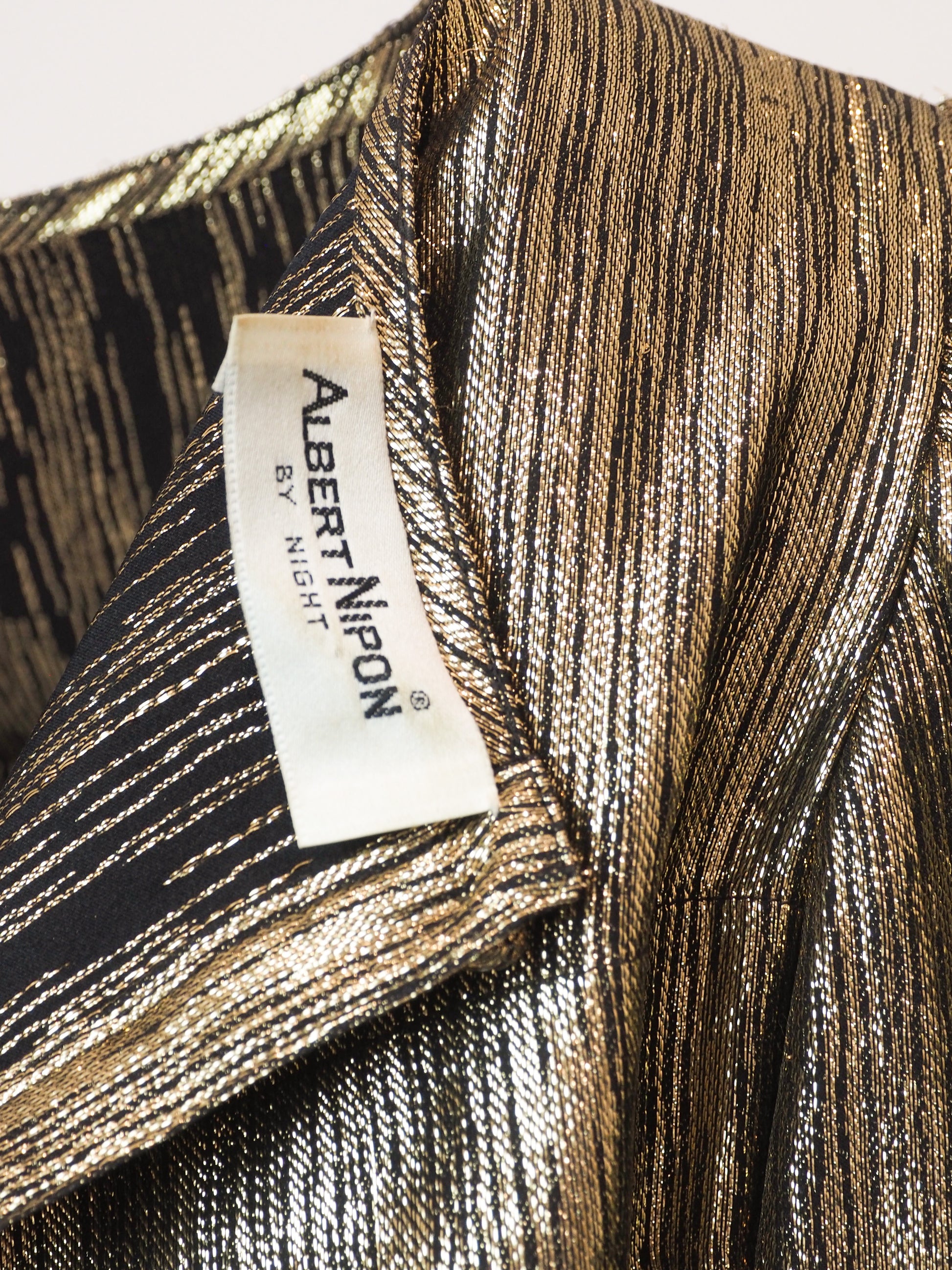A vintage Albert Nipon metallic bronze cropped blouse with puffed short sleeves and a textured, pleated fabric finish