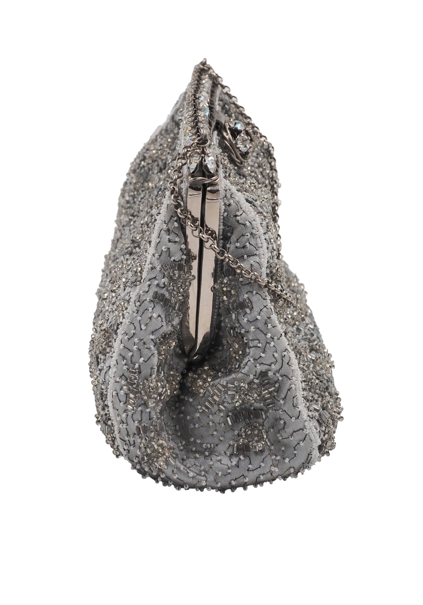 A vintage Elizabeth Arden silver-gray beaded evening clutch bag with a chain strap and a decorative crystal-embellished clasp