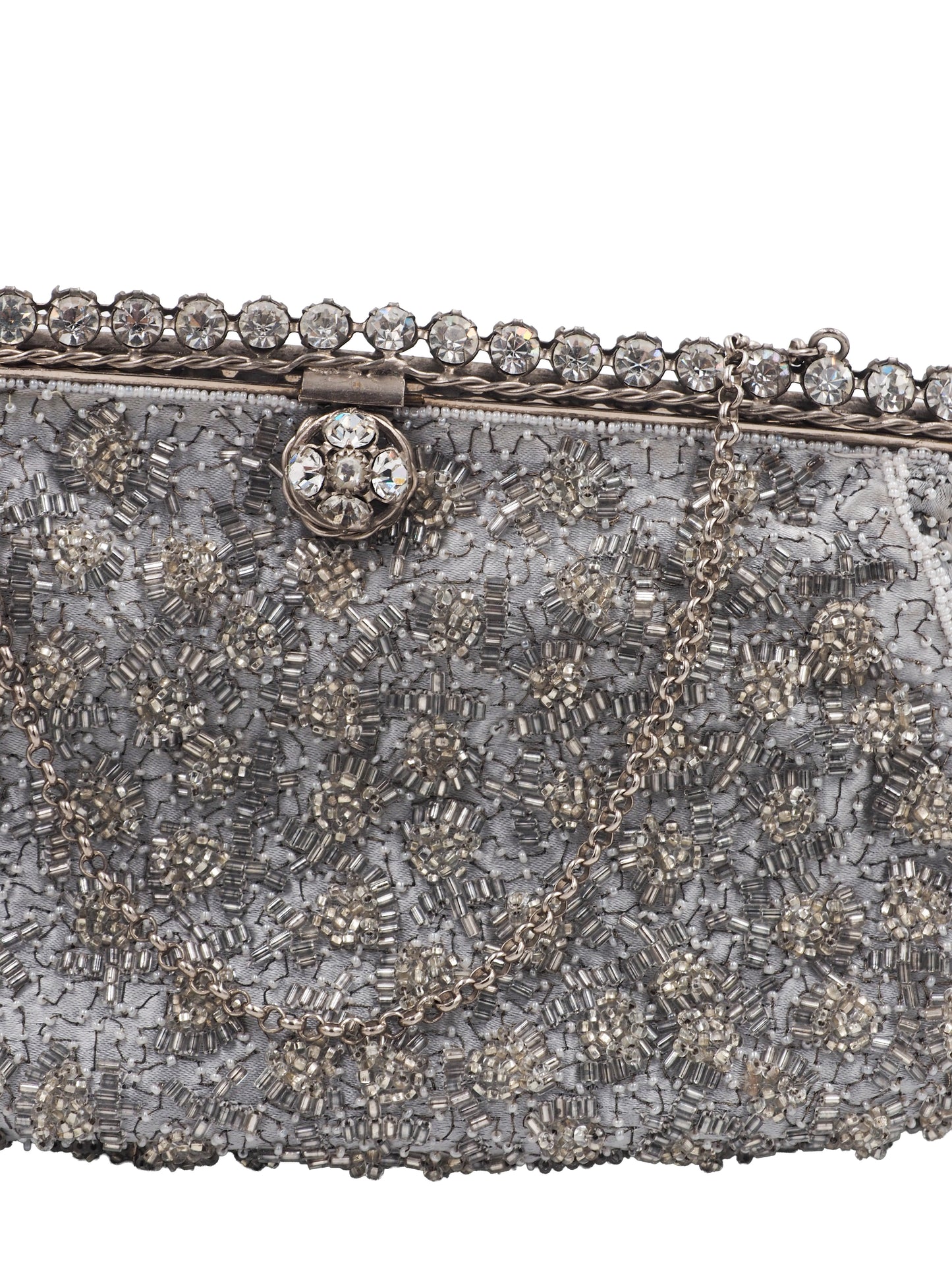 A vintage Elizabeth Arden silver-gray beaded evening clutch bag with a chain strap and a decorative crystal-embellished clasp