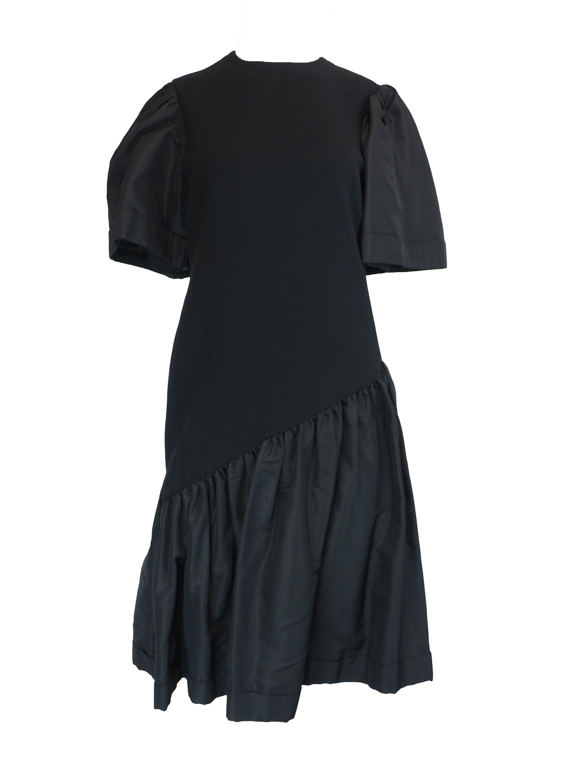 A black vintage 1980s pauline trigere dress with short puff sleeves, a matching waist belt, and a large bow detail at the side