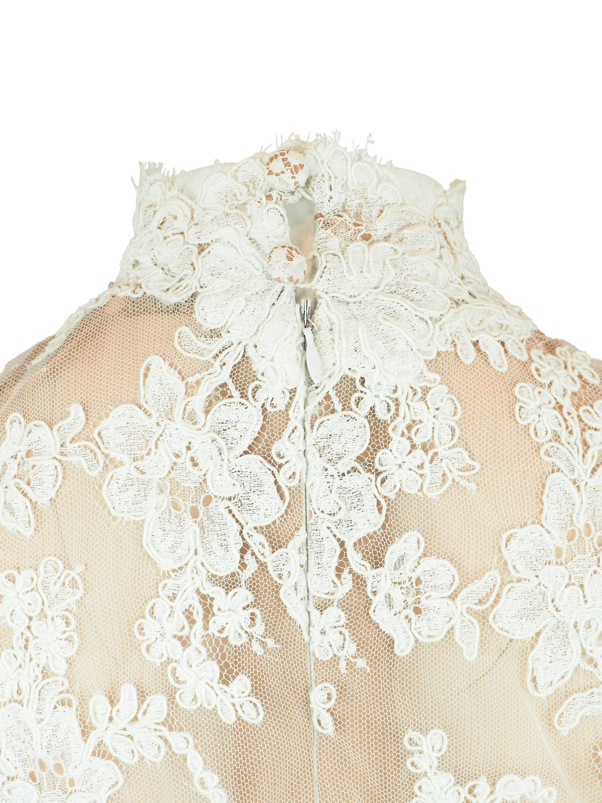A sleeveless high-neck sheer mesh top featuring an intricate white floral lace overlay