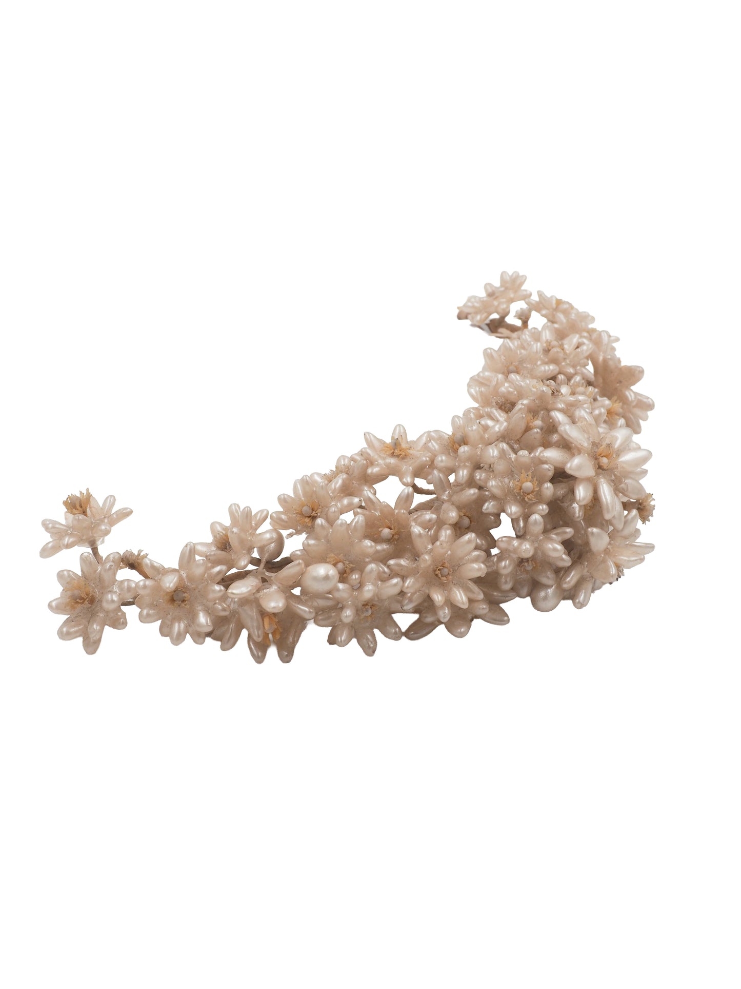 A vintage wedding delicate floral headband featuring small cream-colored faux flowers and branches