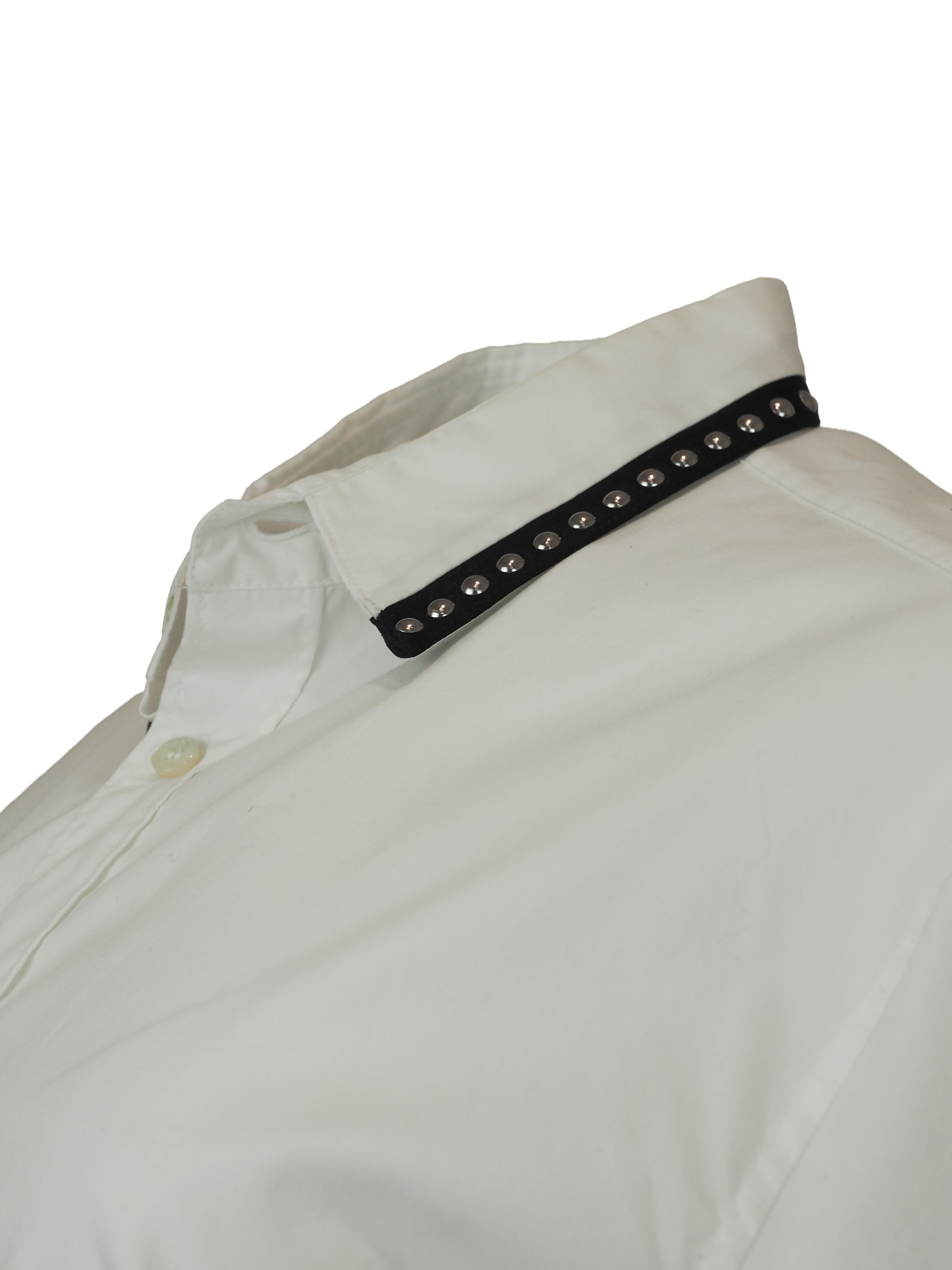A vintage Roberto cavalli white long-sleeve button-down shirt with black and silver patterned stud trim on the collar and cuffs