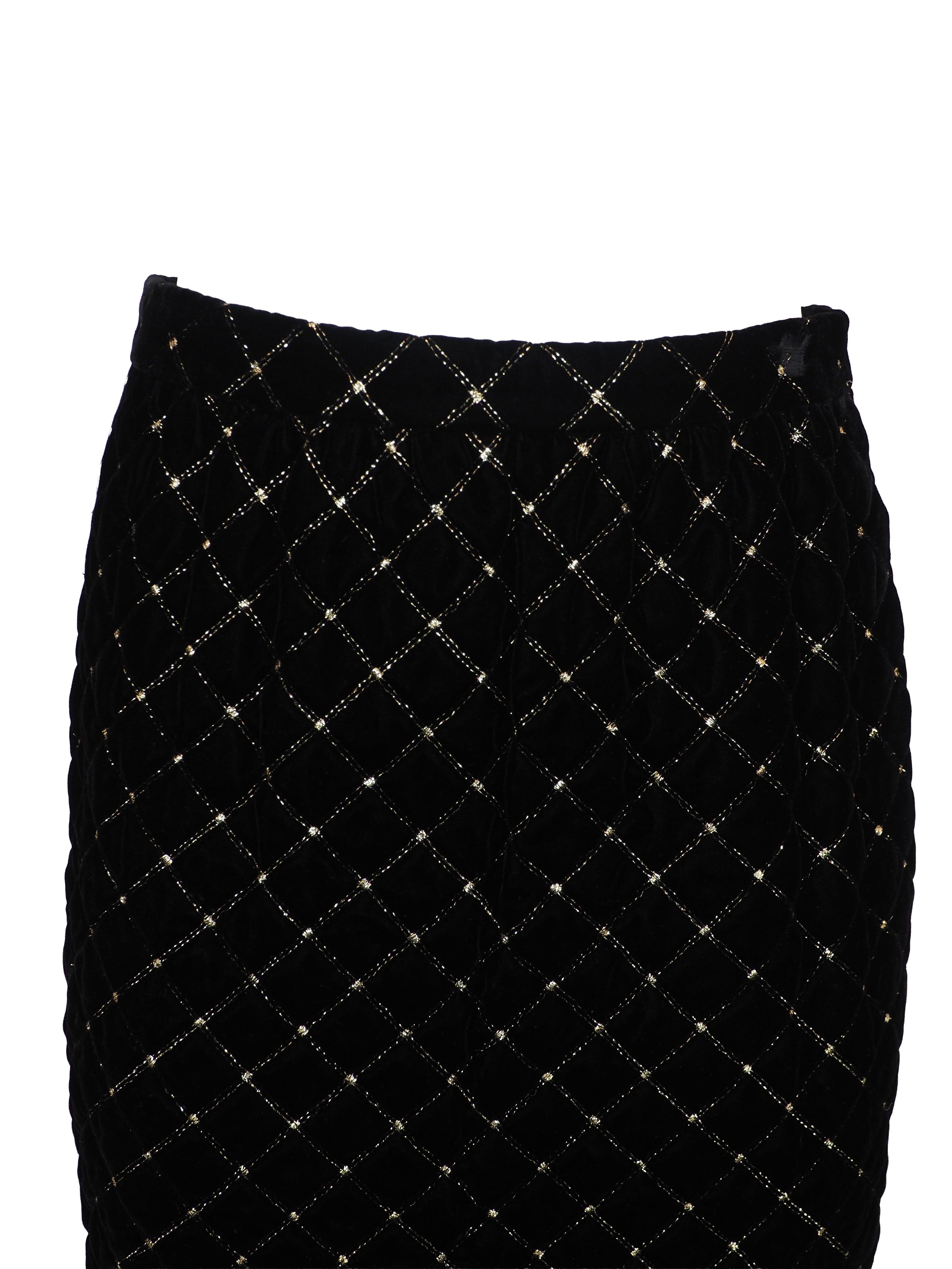 A vintage Celine black velvet two-piece suit set consisting of a cropped jacket and a matching pencil skirt, both decorated with a gold diamond lattice pattern and gold trim