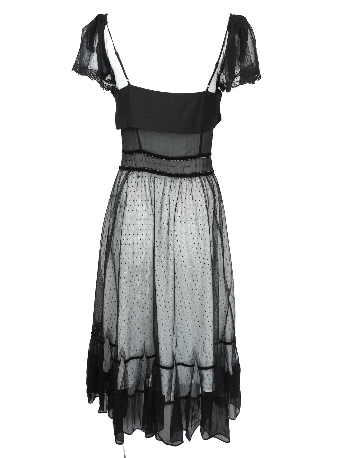 A vintage Chloe 2005 black sheer mesh dress with a solid black off-the-shoulder yoke, a polka-dotted tulle skirt, and ruffled trim details