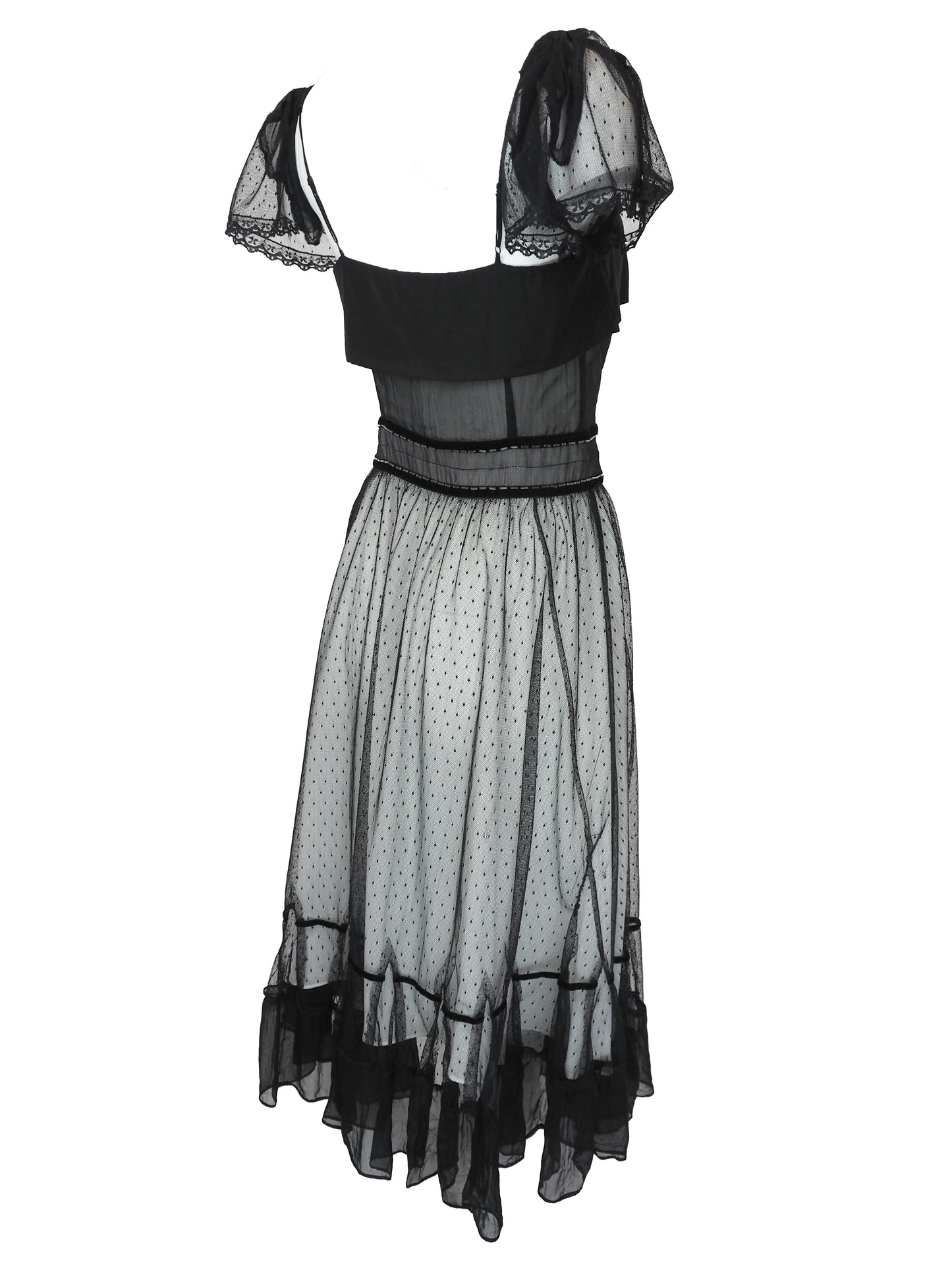 A vintage Chloe 2005 black sheer mesh dress with a solid black off-the-shoulder yoke, a polka-dotted tulle skirt, and ruffled trim details