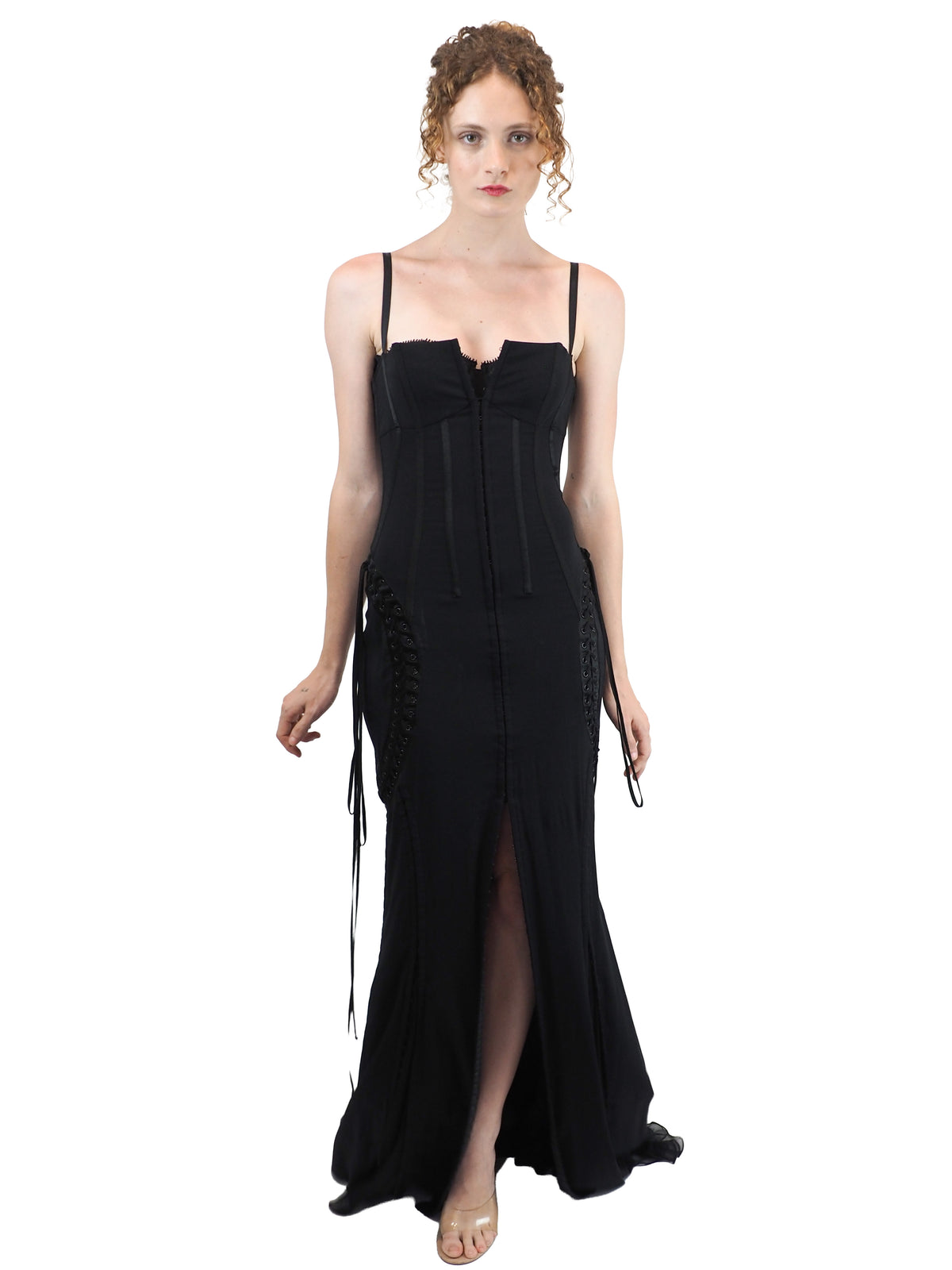 A vintage 2003 dolce and Gabbana long black spaghetti-strap dress with a corset-style bodice, side lace-up details, and a high front slit