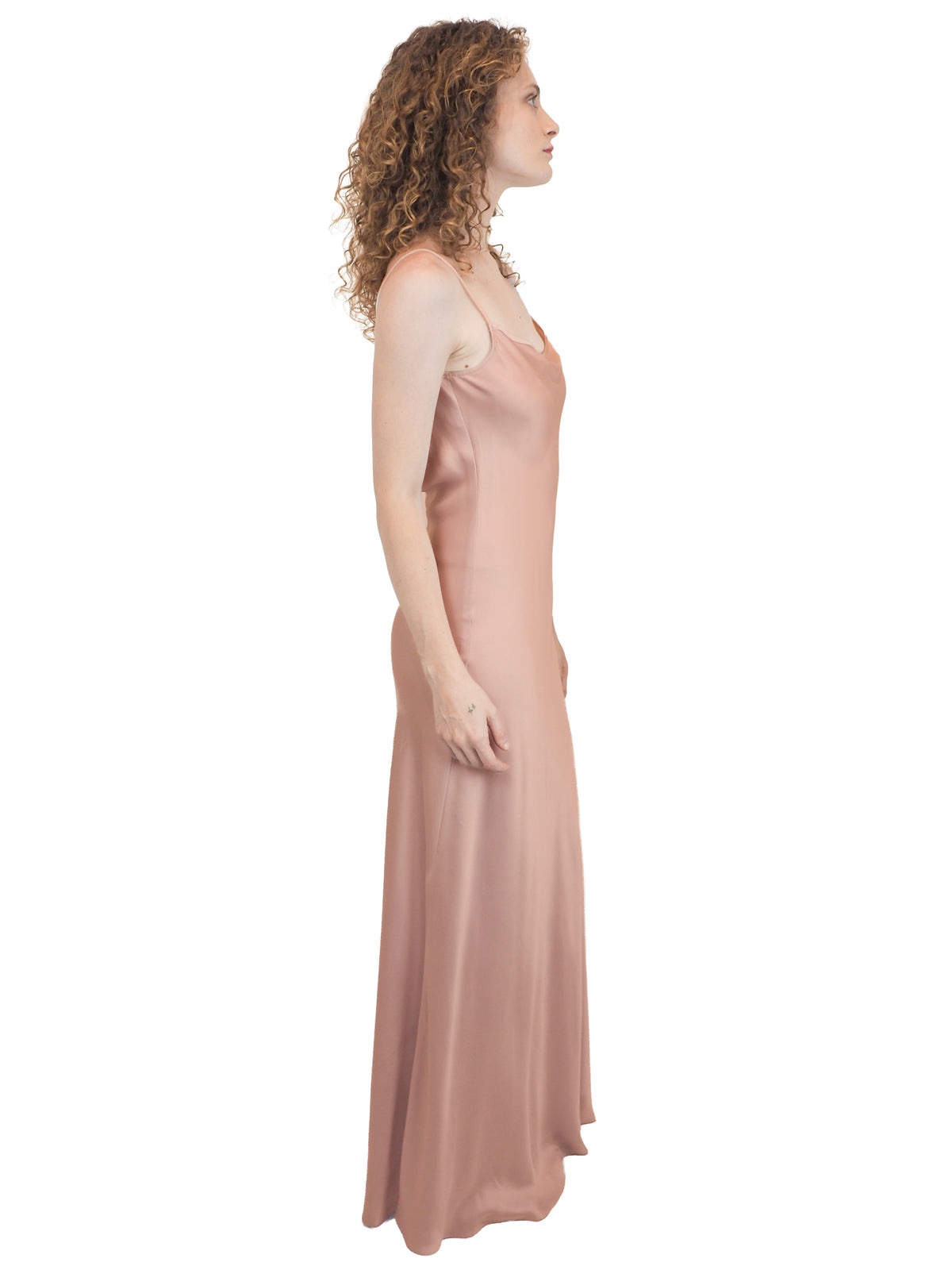 a vintage bridal floor-length, satin silk slip gown in a dusty rose pink color 