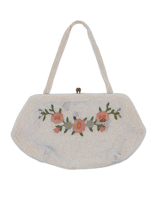 A vintage beaded handbag in a warm off-white/cream tone, featuring a floral embroidered pattern with pink, orange, and green details across the front, a small gold-tone clasp, and shoulder straps.