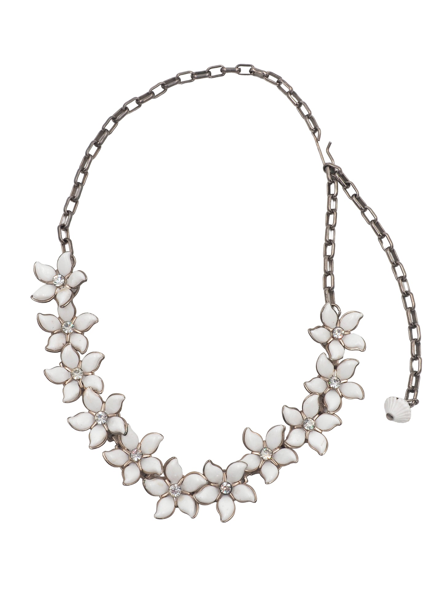 A vintage bridal silver-tone chain necklace featuring a row of white enamel flower blossoms with small clear rhinestone accents