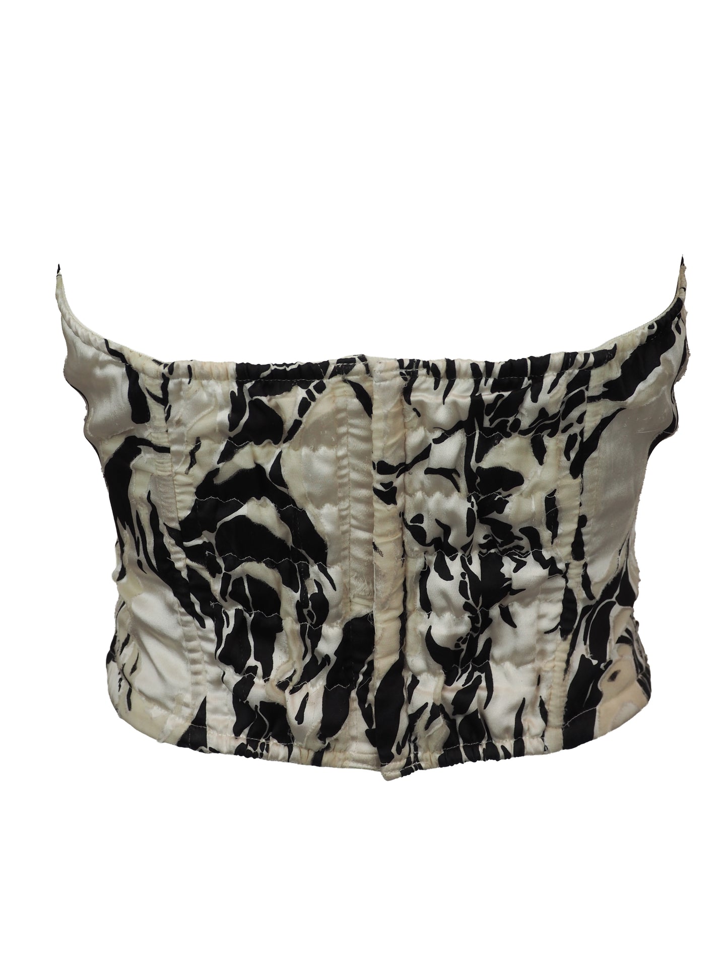 A vintage silk strapless sweetheart bustier top featuring a dramatic black and white abstract marbled pattern with heavy ruffle detailing
